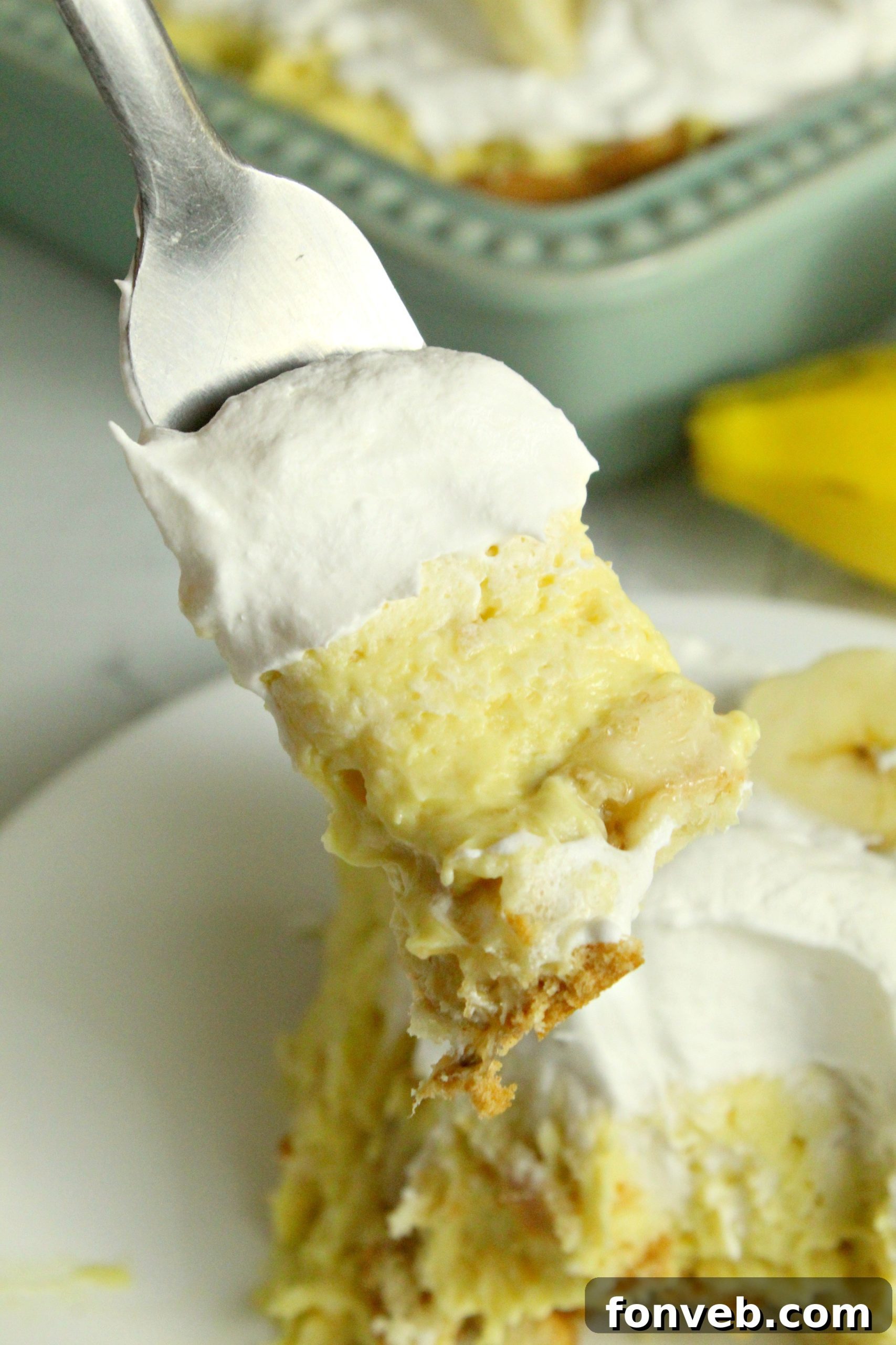 Simple Chilled Banana Pudding 9 A bowl filled with light and fluffy whipped topping, prepared for the banana pudding.