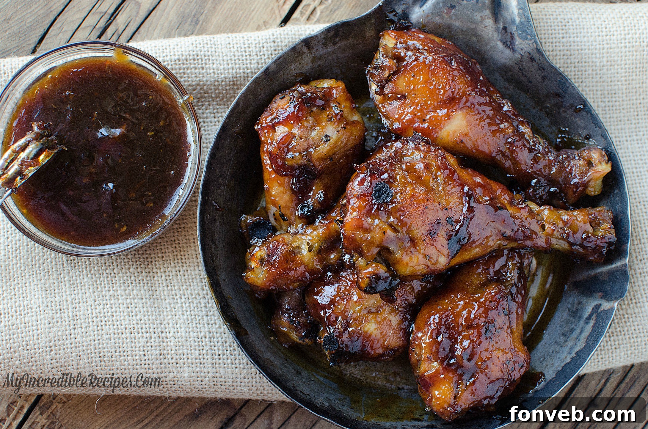 Sauce in a bowl next to chicken
