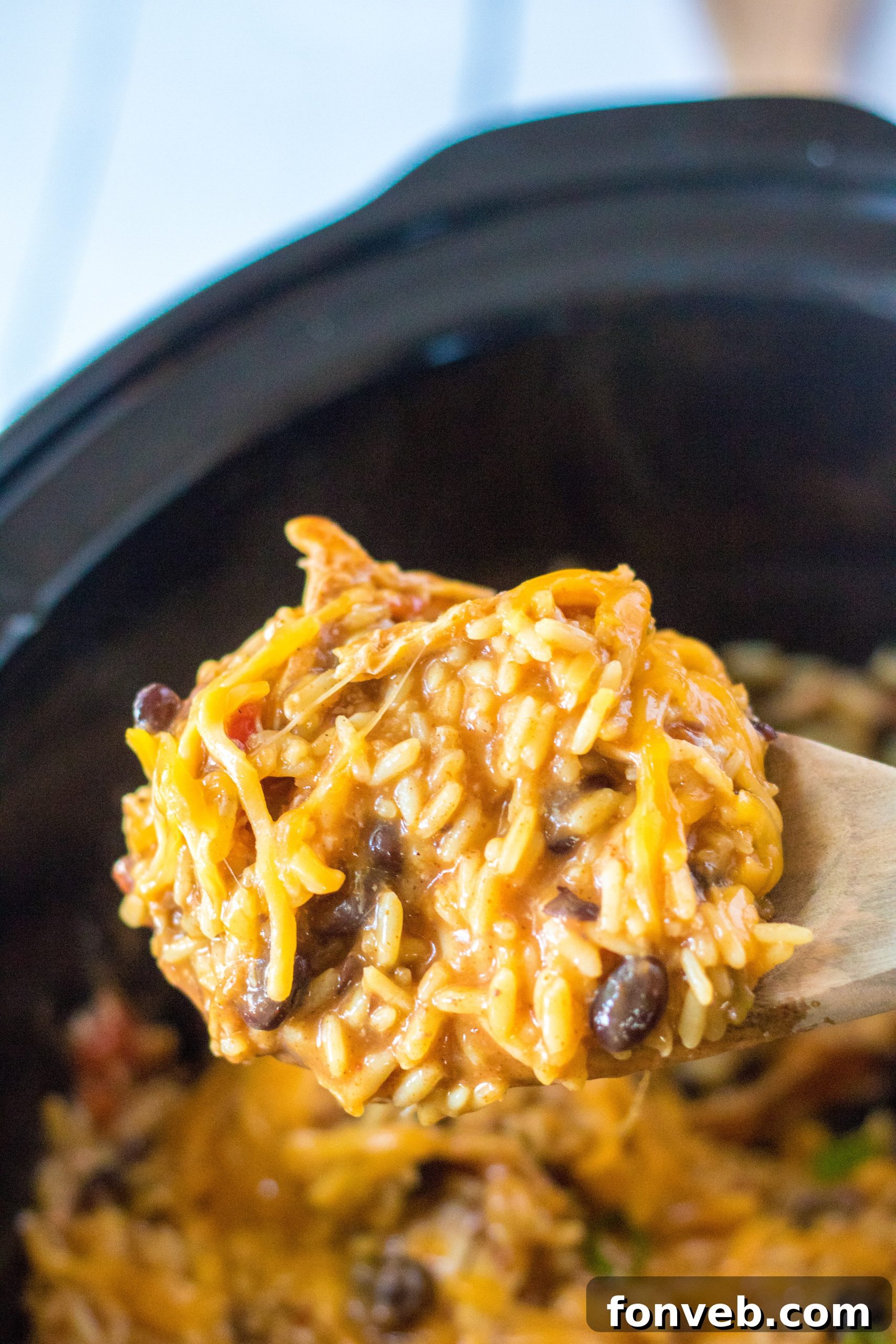 Creamy Slow Cooker Cheesy Chicken Taco Rice 11 Black beans being rinsed and drained