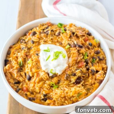 Creamy Slow Cooker Cheesy Chicken Taco Rice 15 Slow Cooker Cheesy Chicken Taco Rice recipe card image