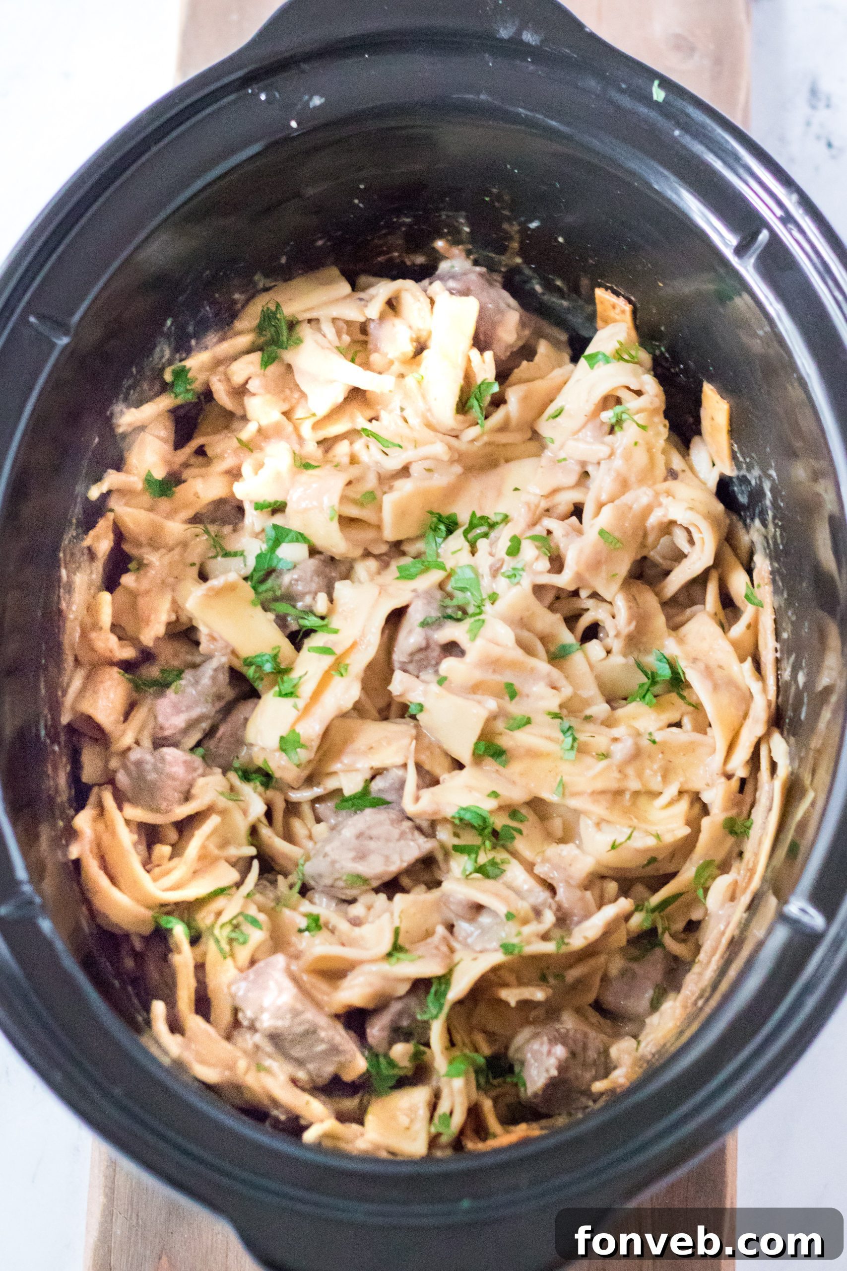 Raw stew beef chunks ready for the crock pot