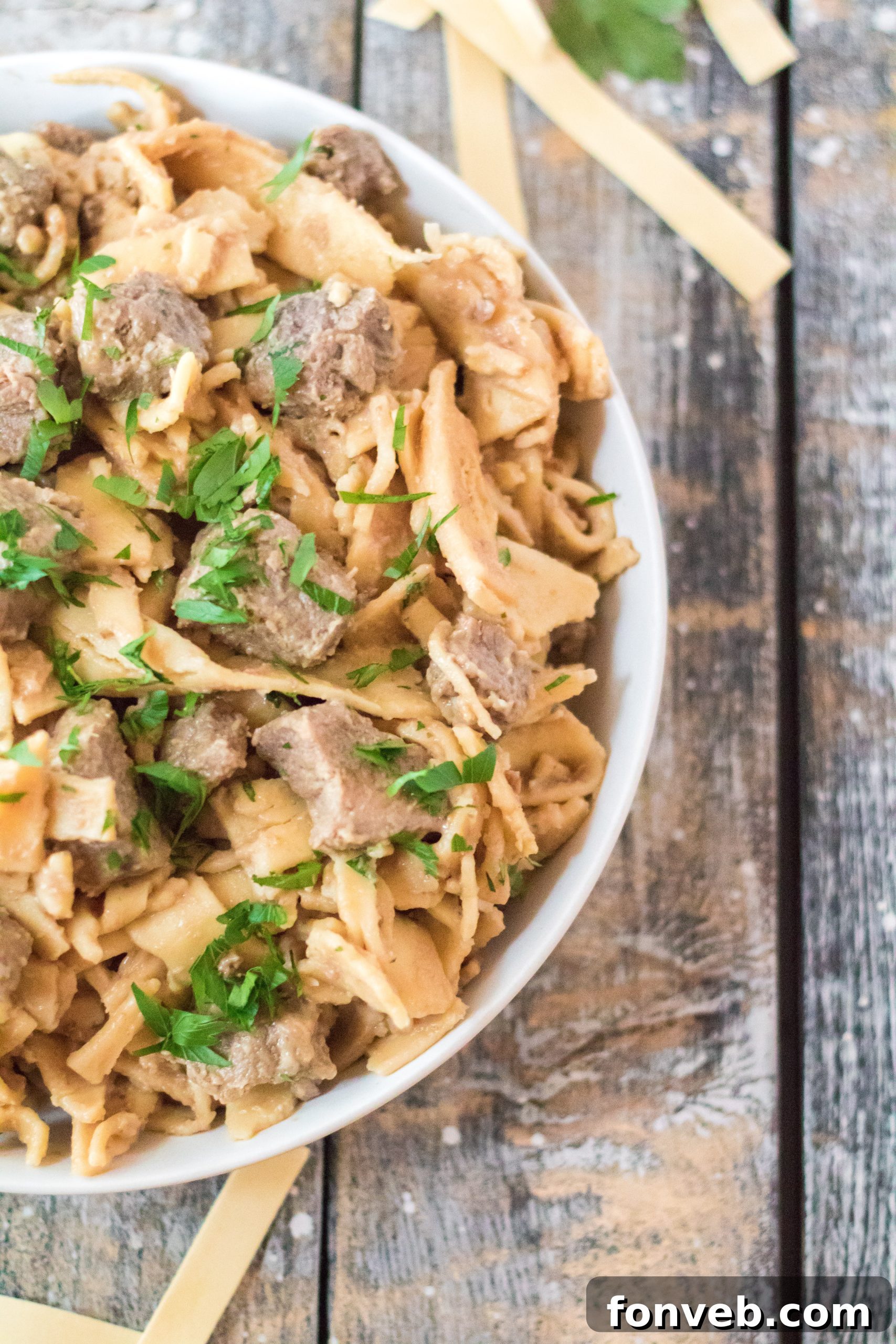 Another view of Crock Pot Beef & Noodles in a slow cooker