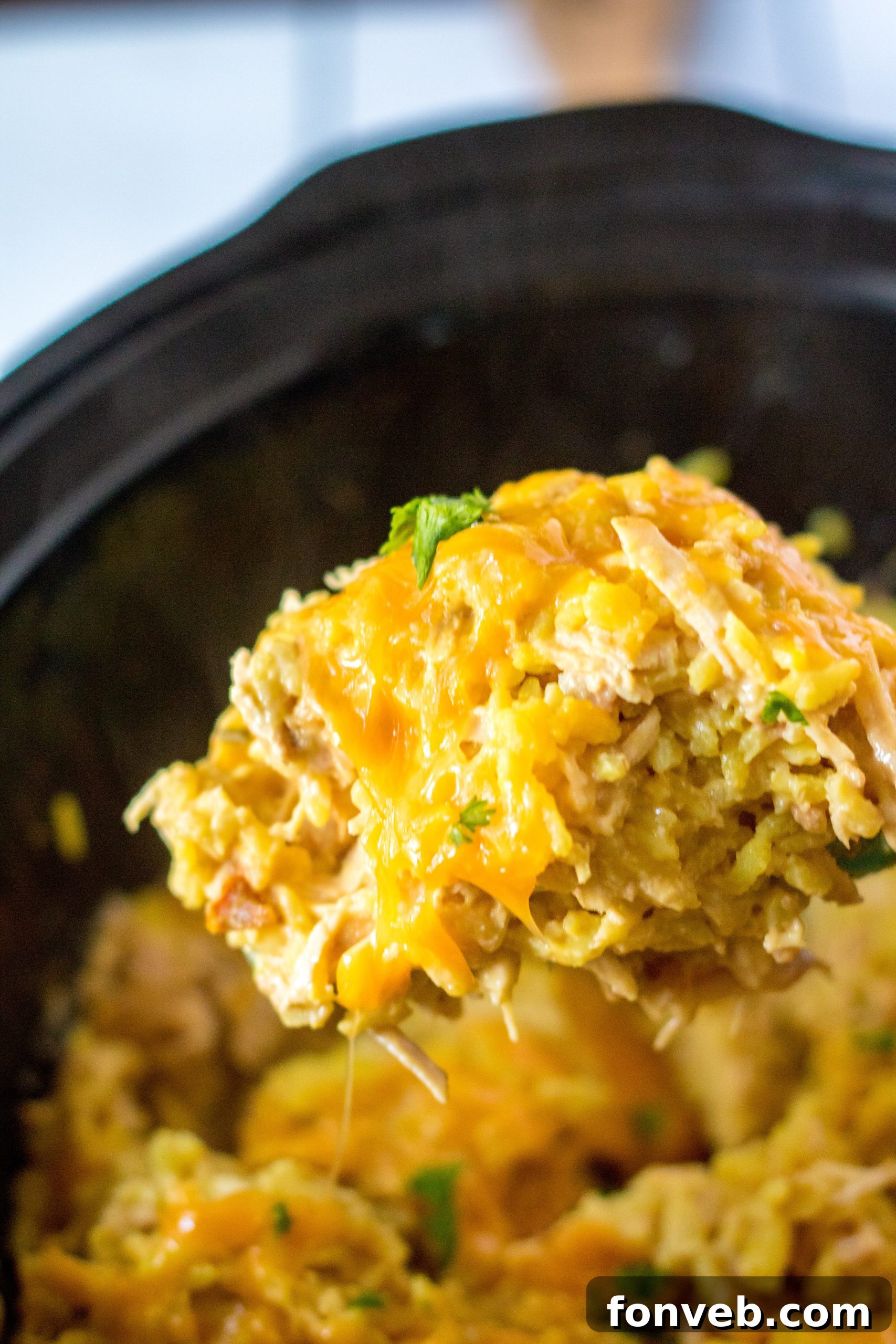 A full Slow Cooker Cheesy Chicken and Rice meal, ready to be enjoyed.