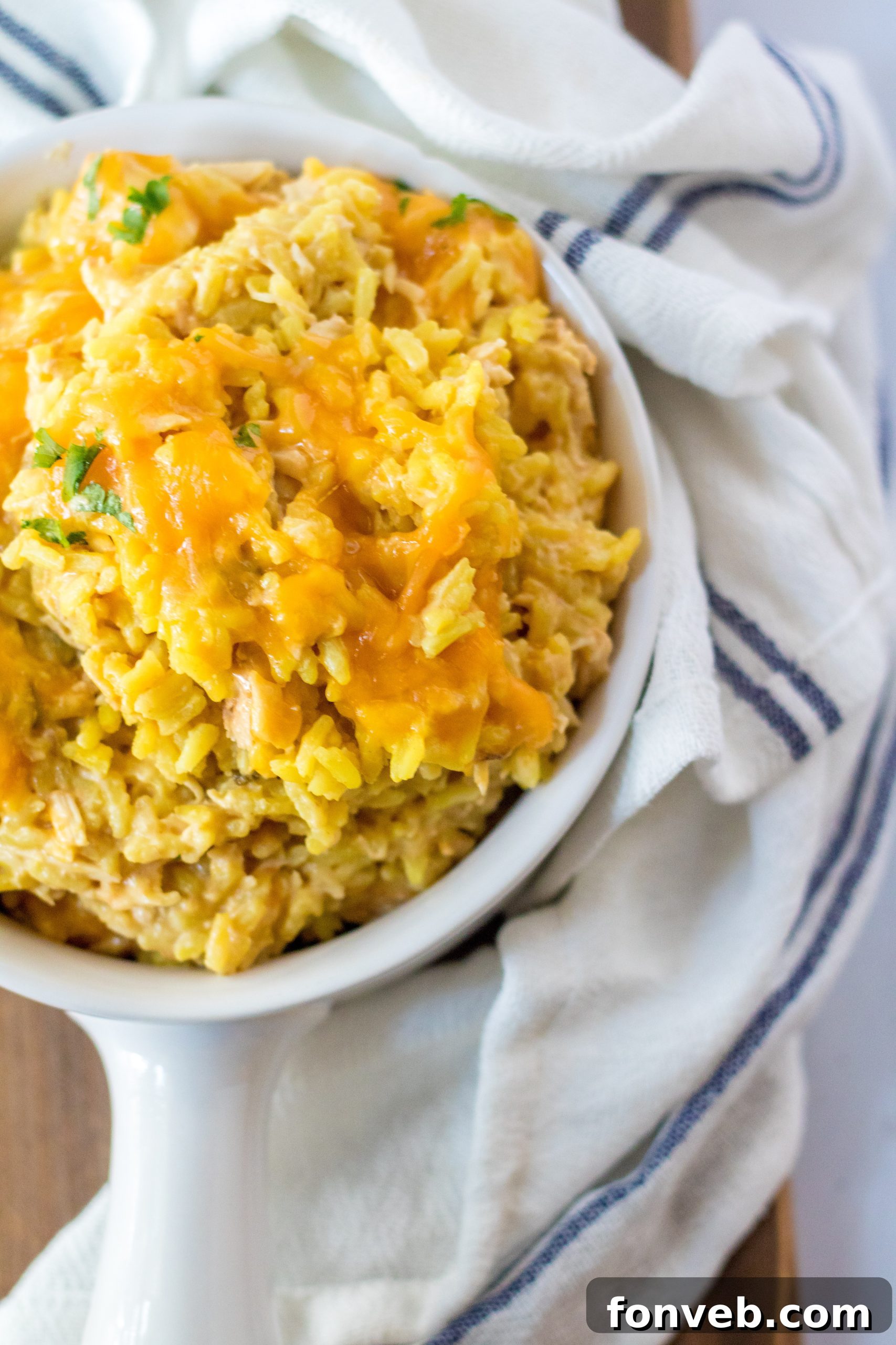 Another perspective of the dish, highlighting the shredded chicken and creamy sauce.