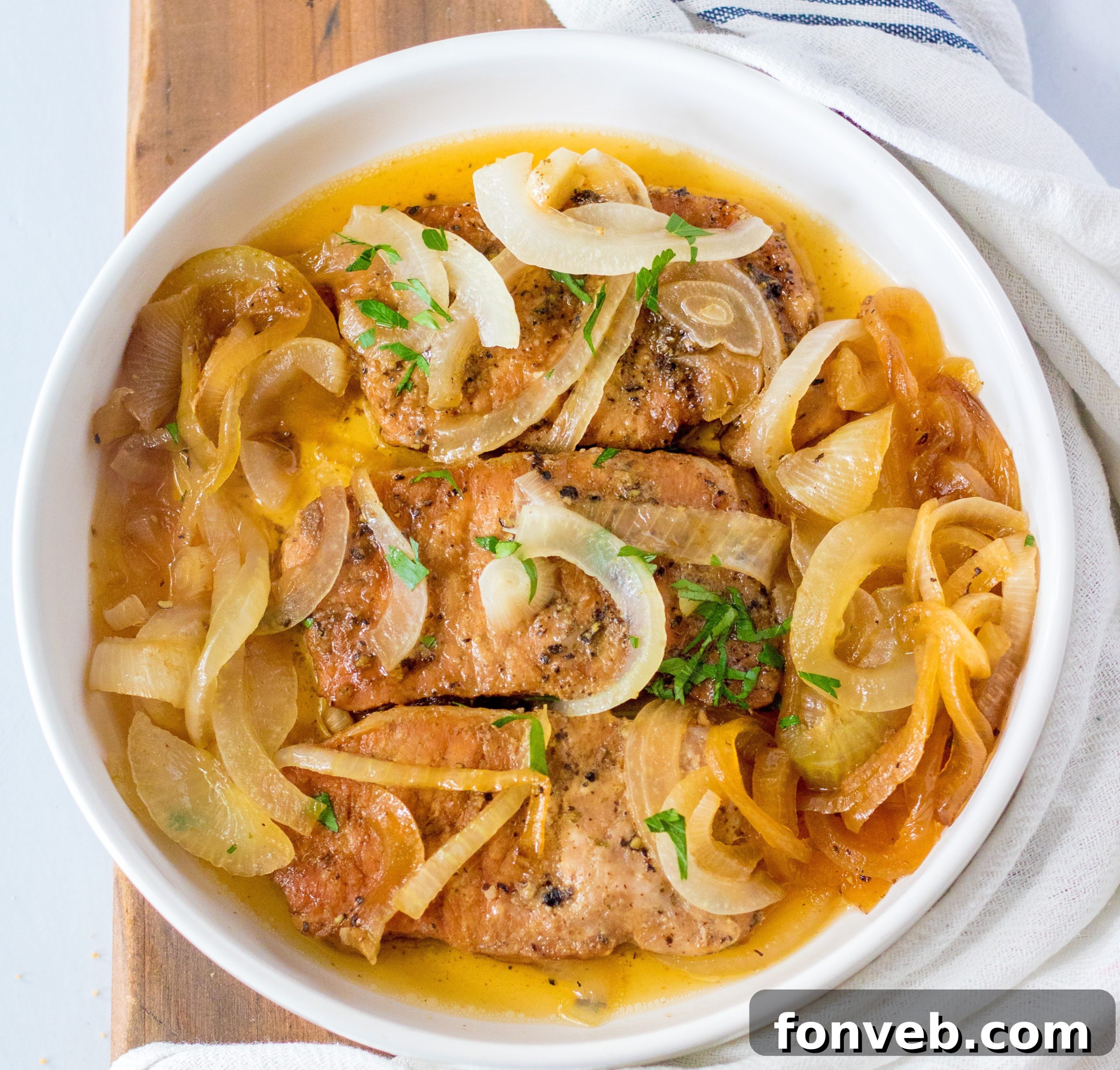 A side dish of creamy mashed potatoes, perfect for serving with pork chops