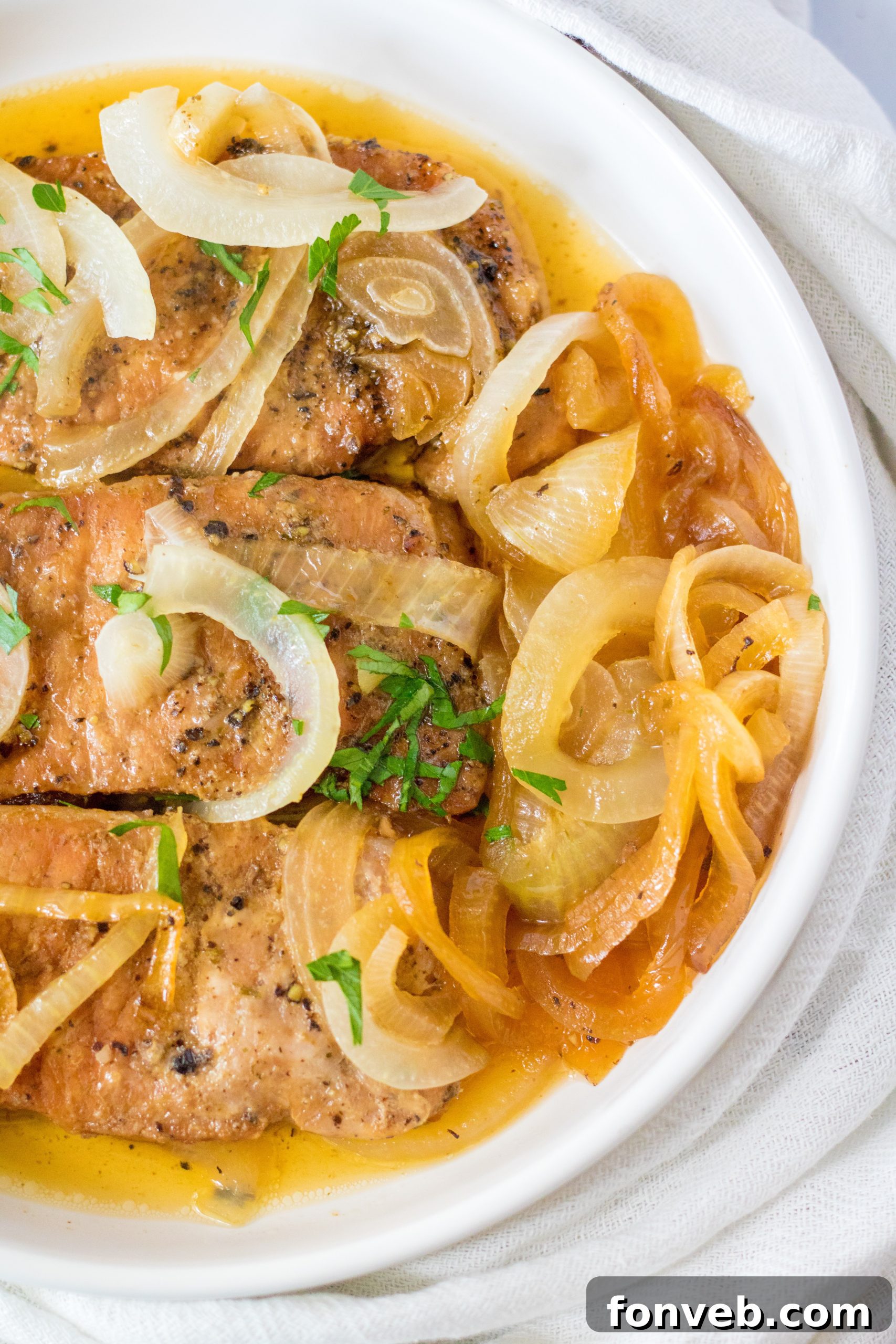 A block of salted butter with a knife, ready to be sliced for the recipe