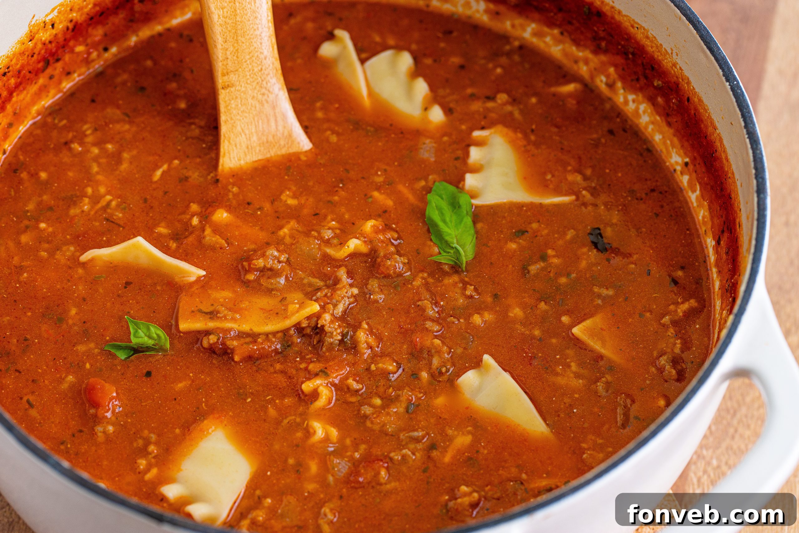 Close-up of Lasagna Soup in a bowl with a spoon