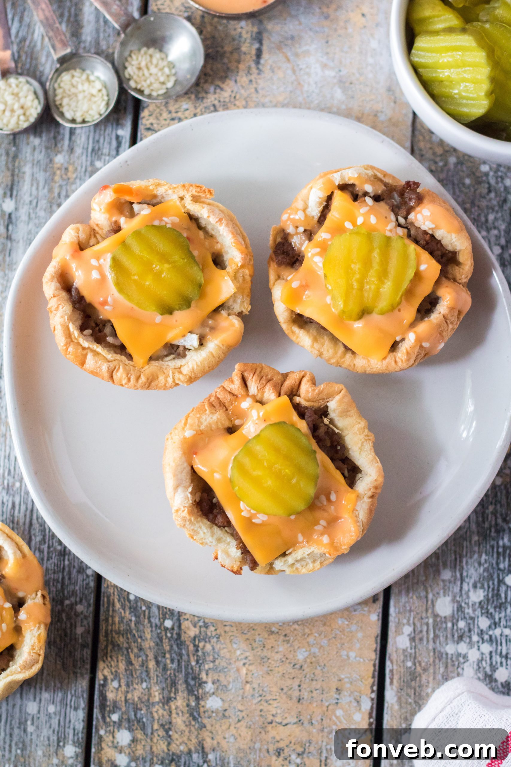Finely chopped white onions on a cutting board.