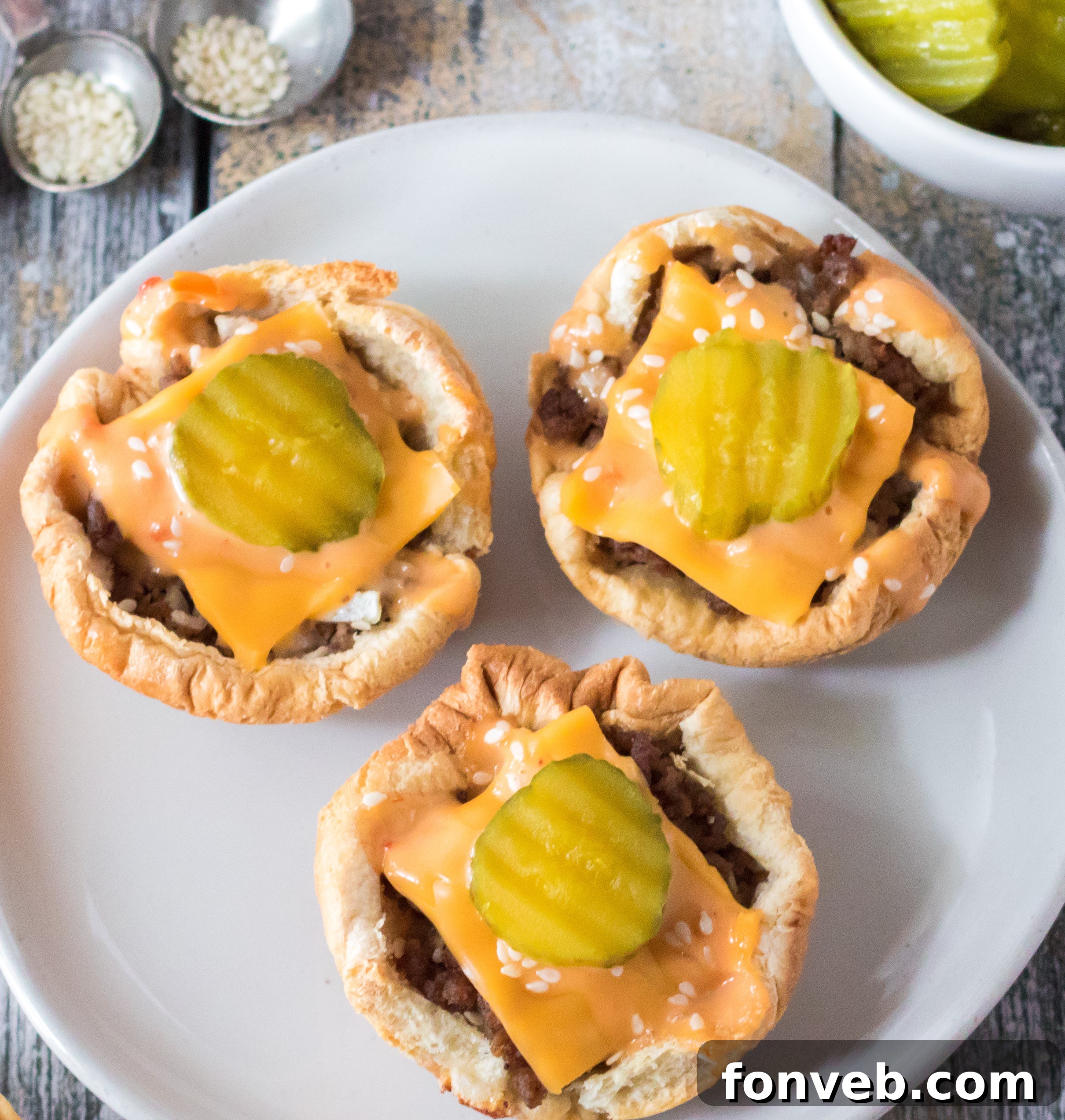 Twelve Big Mac Cups baked and arranged in a muffin tin.