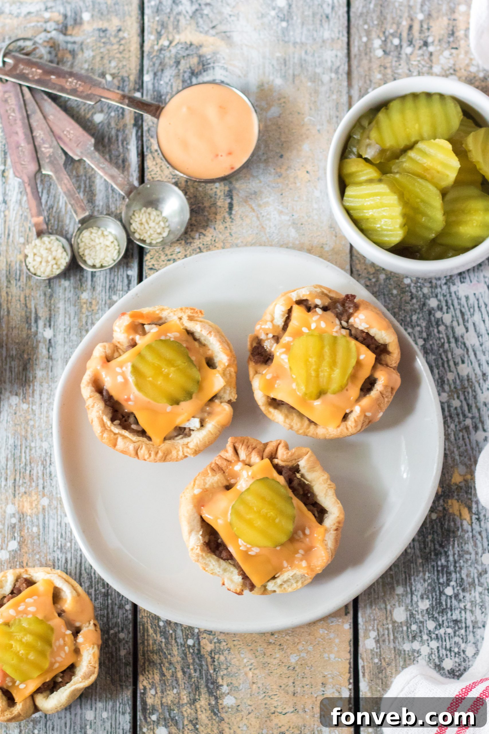 Various brands of Thousand Island dressing on a shelf.