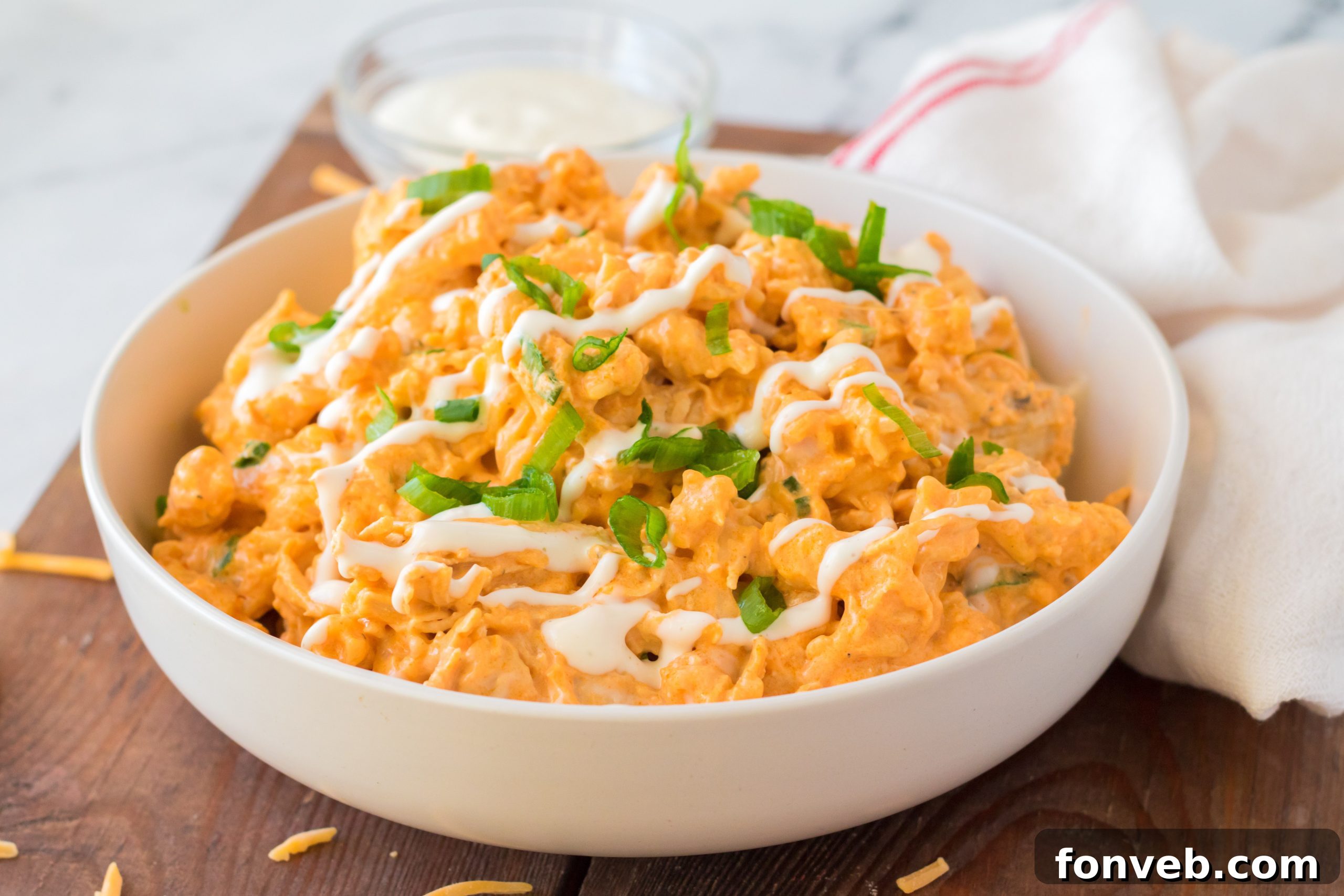 Tangy Slow Cooker Buffalo Chicken Mac and Cheese 12 A close-up of the Buffalo Chicken Mac & Cheese, highlighting its creamy and slightly spicy appearance.