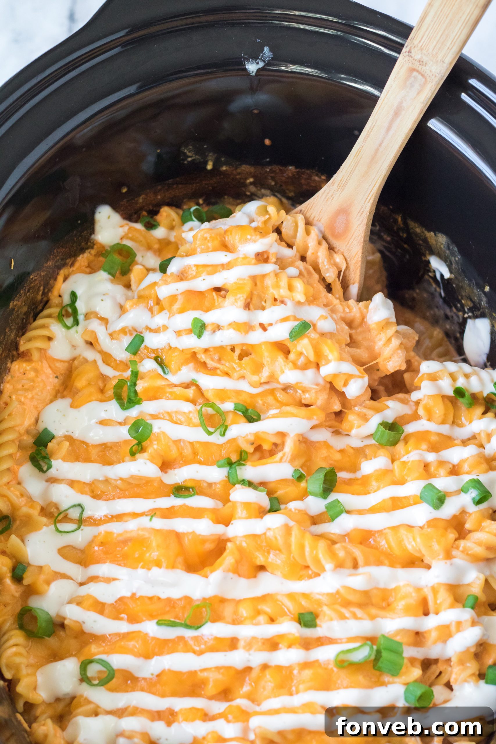 Tangy Slow Cooker Buffalo Chicken Mac and Cheese 13 Various types of cheese, suggesting alternatives for the recipe.