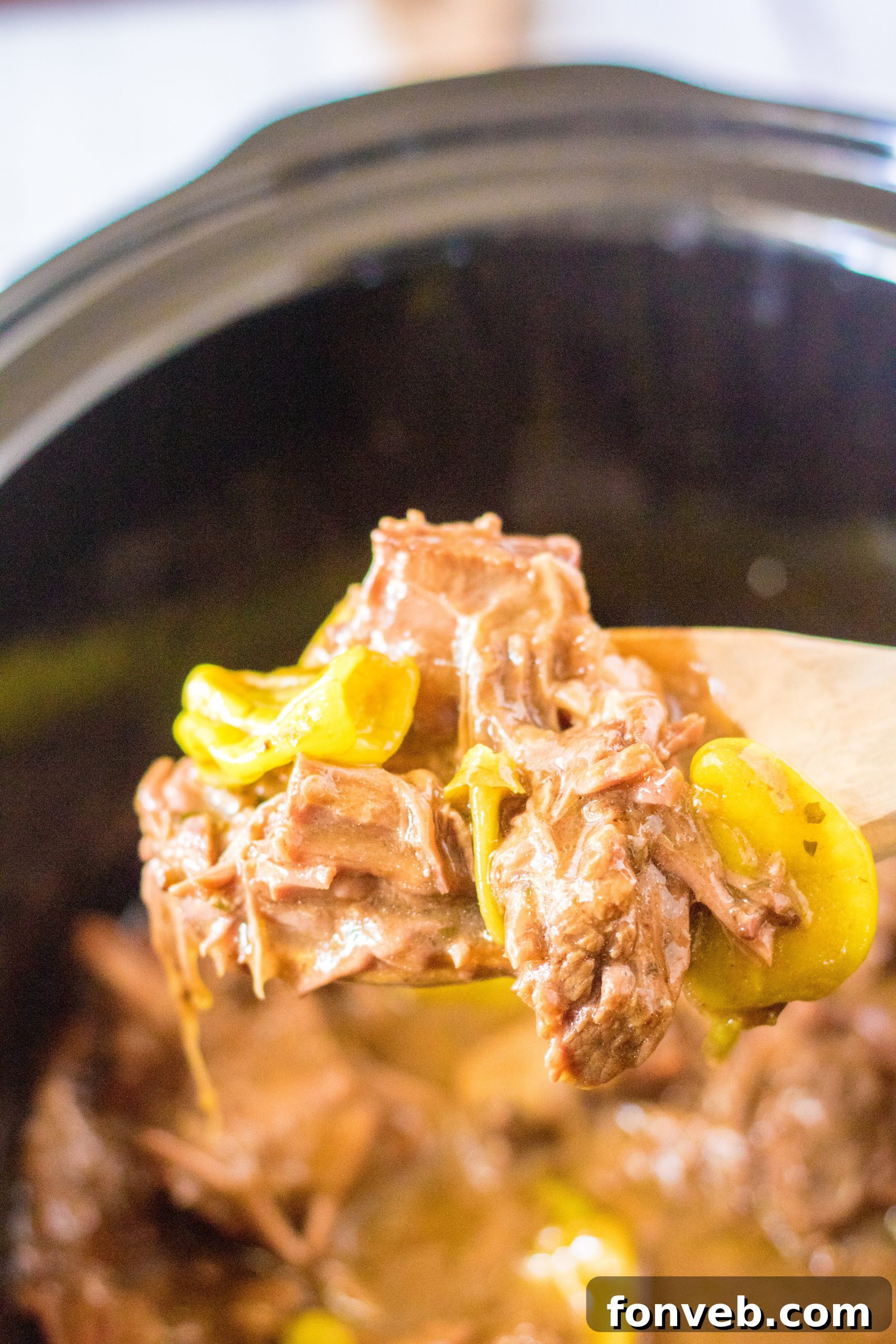 Melt-in-Your-Mouth Slow Cooker Mississippi Pot Roast 11 Pork roast, a potential substitute for chuck roast in the recipe.