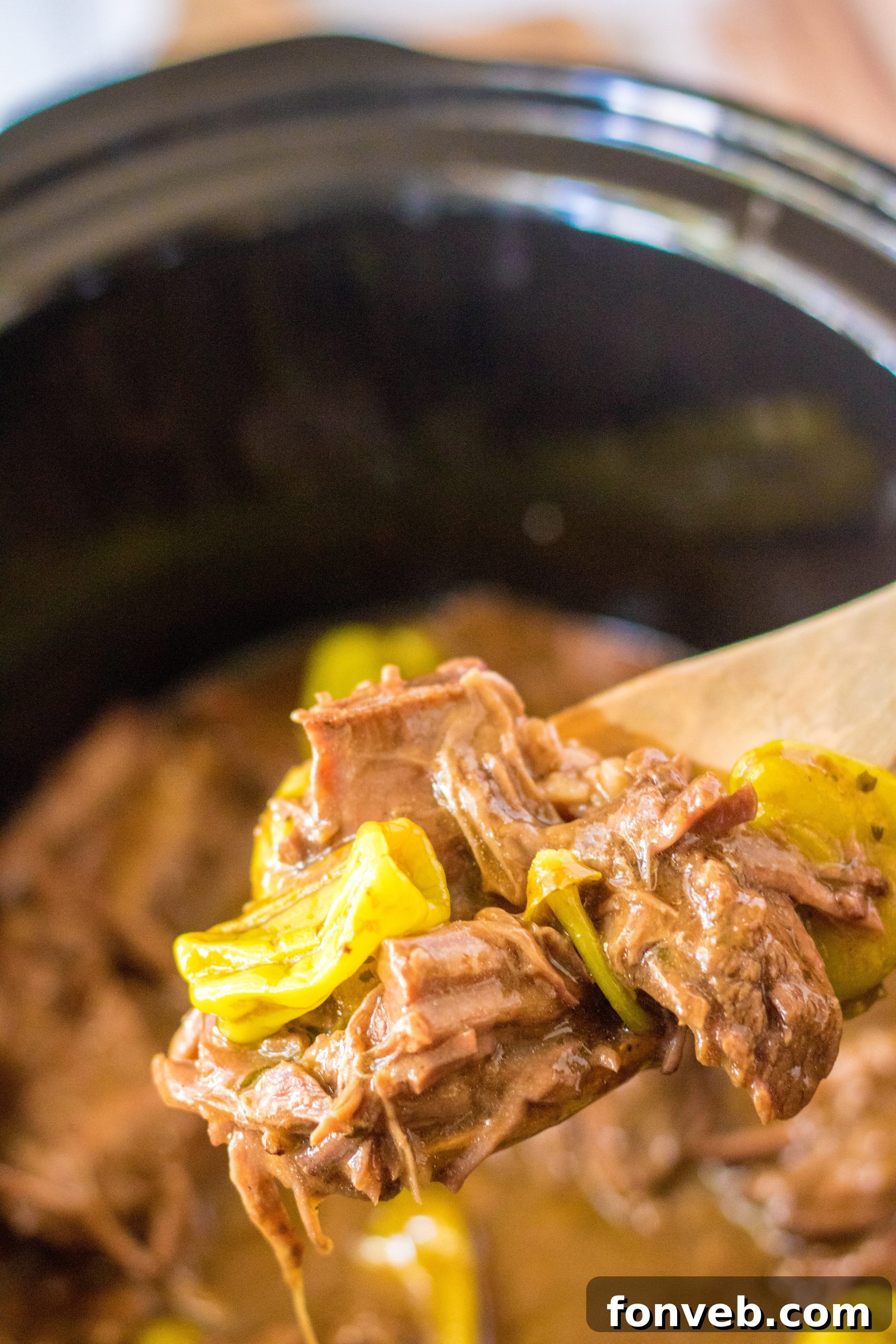 Melt-in-Your-Mouth Slow Cooker Mississippi Pot Roast 9 Jar of whole pepperoncinis, an essential ingredient for the roast.