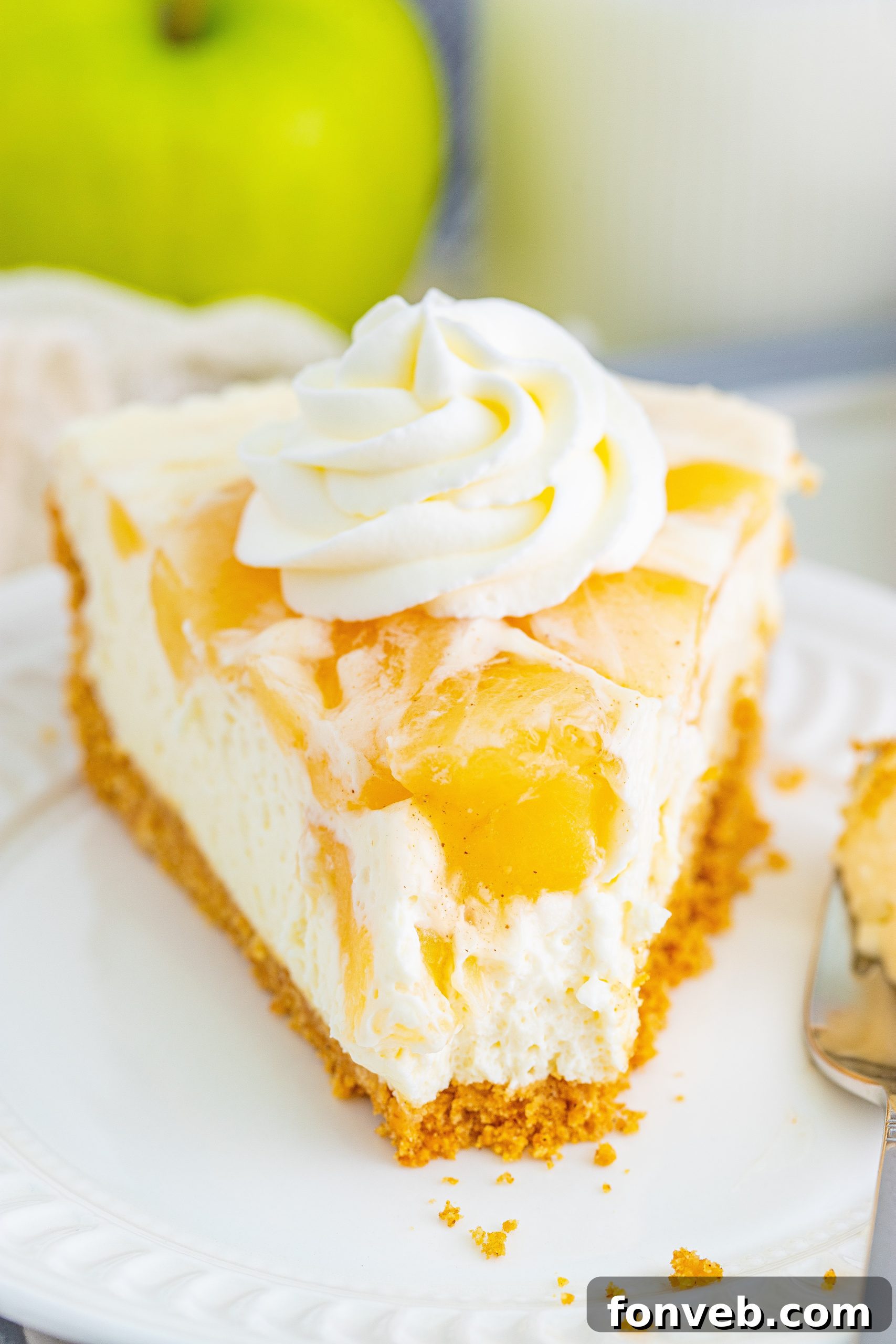 Chilled Apple Pie Cheesecake 2 Deliciously creamy No Bake Apple Cheesecake topped with spiced apples.