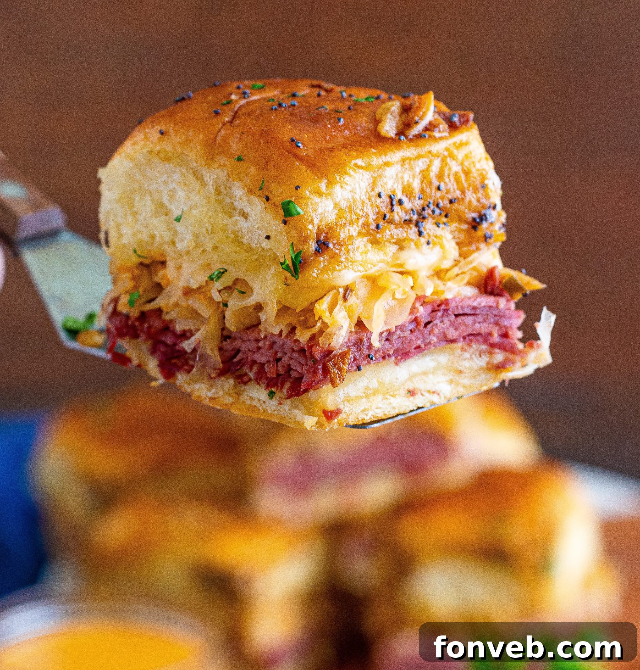 Reuben Sliders with a small bowl of Russian or Thousand Island dressing for dipping.
