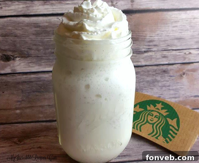 A delightful homemade Frappuccino ready to be enjoyed with a straw.