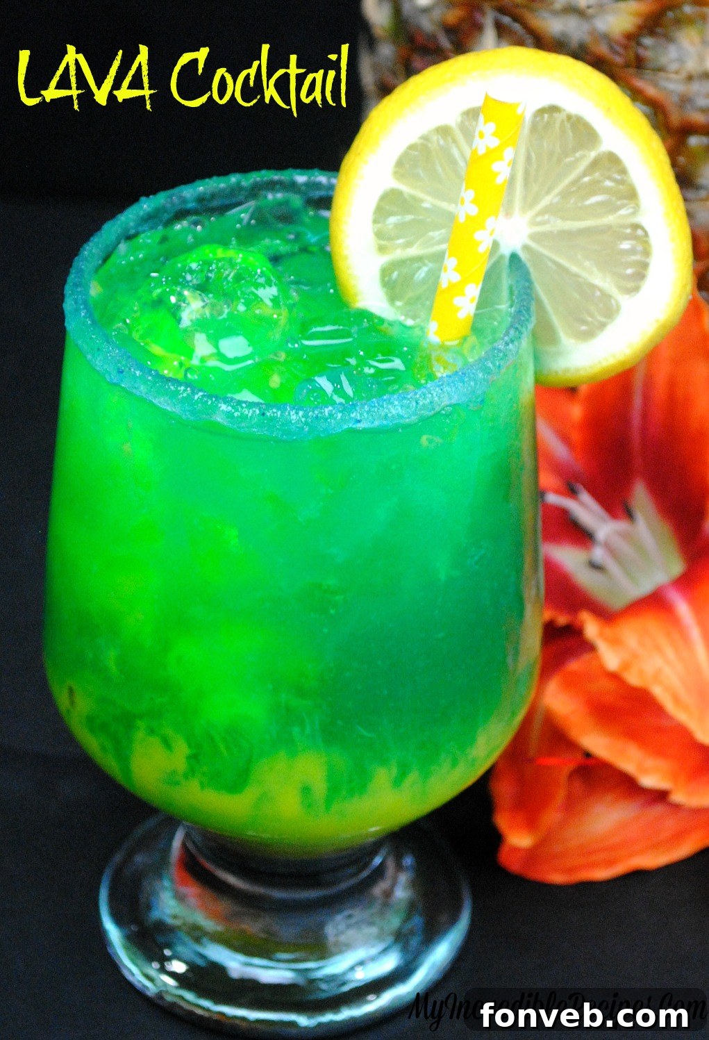 Vibrant blue and red Lava Cocktail with a sugar-rimmed glass, evoking a tropical summer vibe.