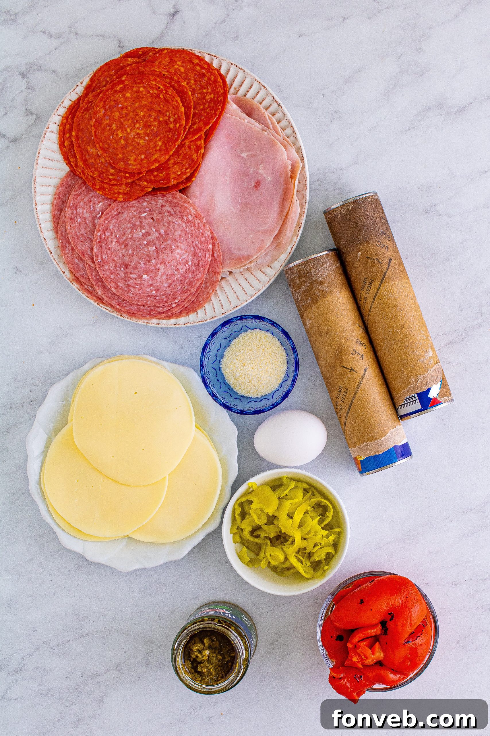 Close-up of baked Italian Antipasto Squares, showing the layers of meat and cheese.
