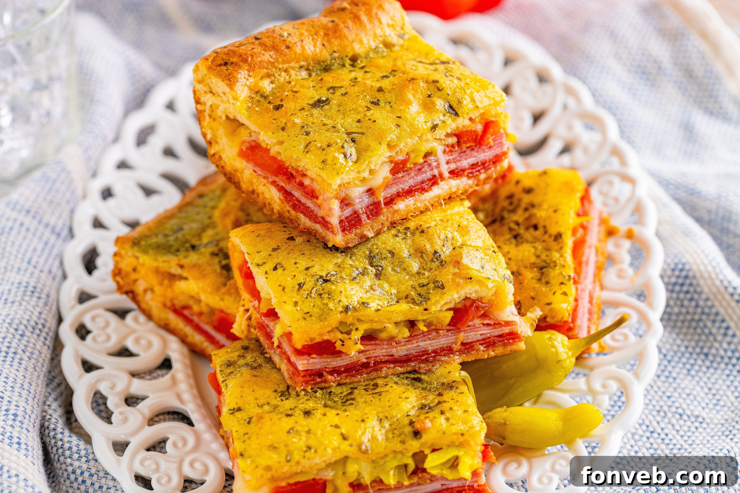 Ingredients for Italian Antipasto Squares laid out on a table before assembly.