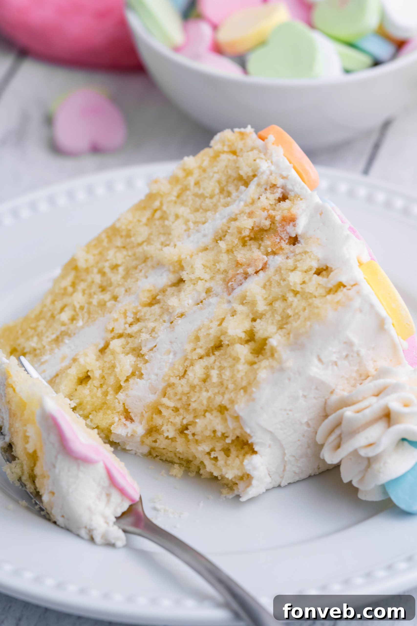 Conversation Hearts Cake layered with buttercream frosting