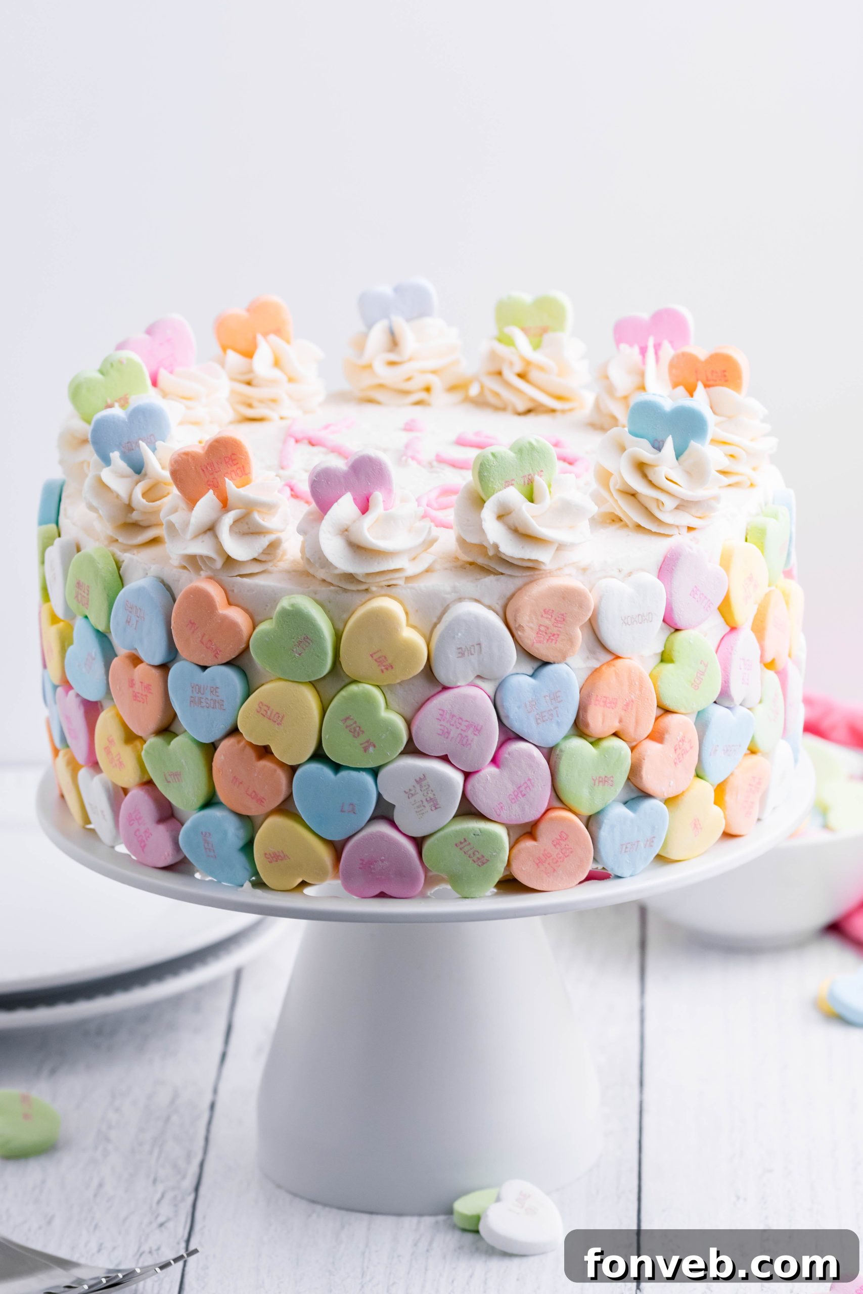 Close-up of a slice of homemade Conversation Hearts Cake