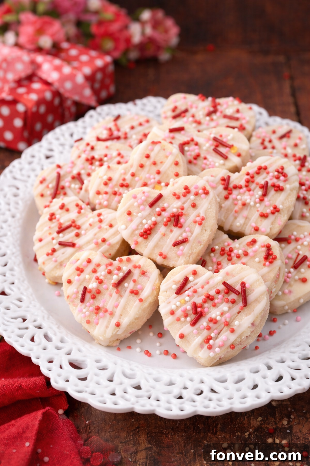 Valentines Day Shortbread Cookie Bites on a pretty white plate, elegantly arranged and ready to be enjoyed.
