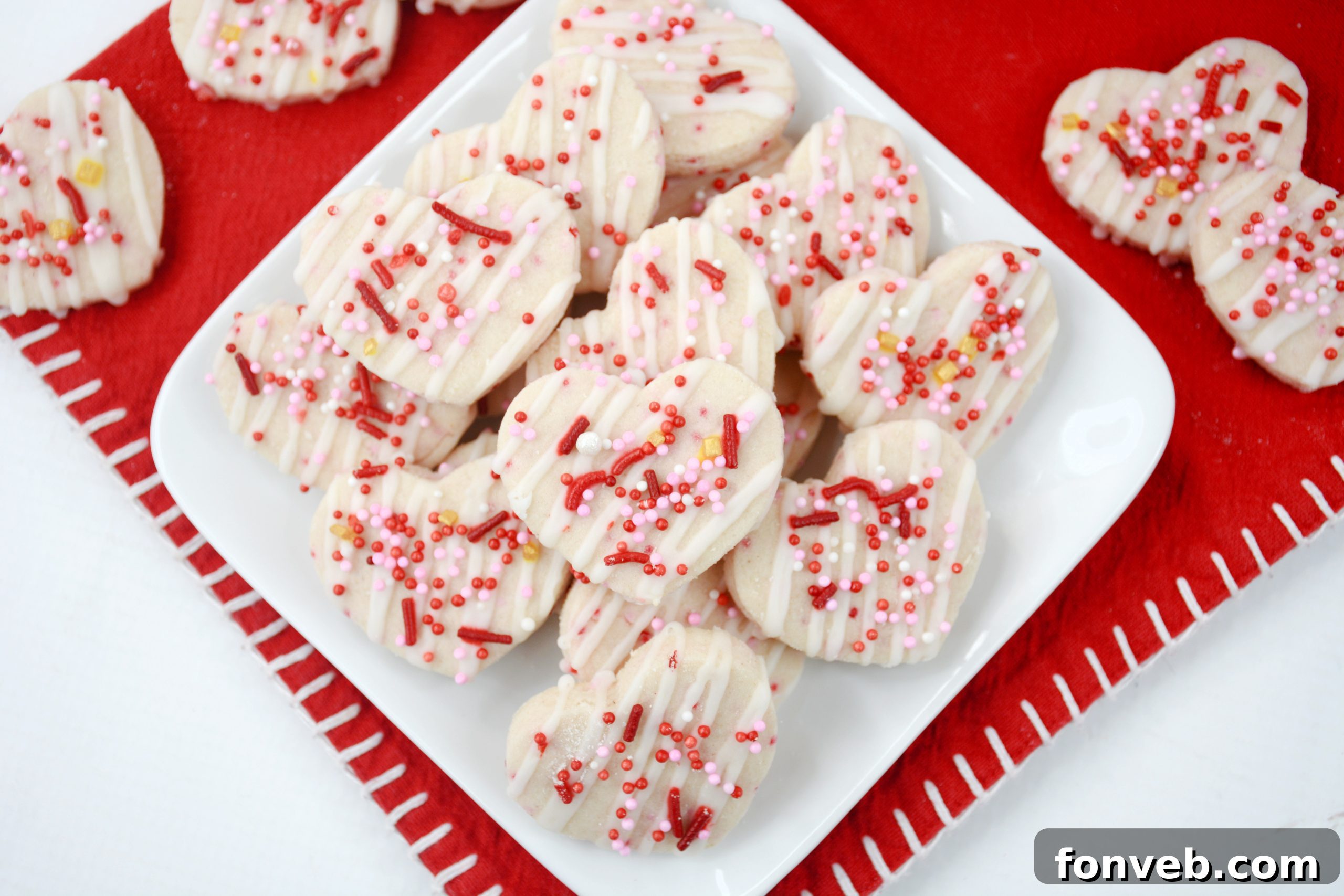 A bowl of pink icing, perfectly colored for Valentine's Day cookies.