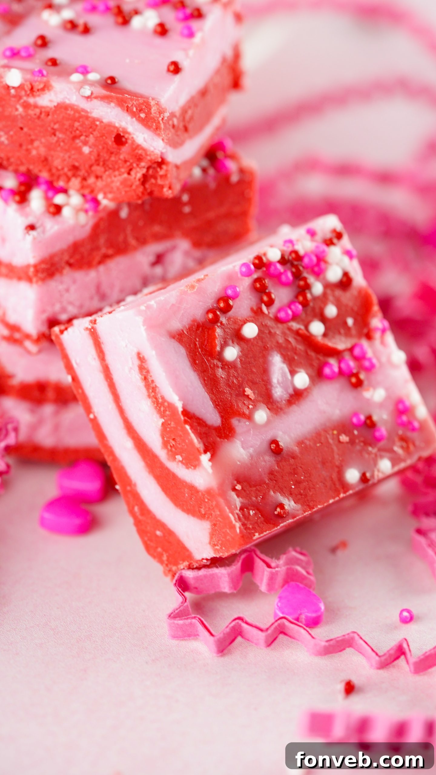 Close-up of pink and red strawberry fudge squares