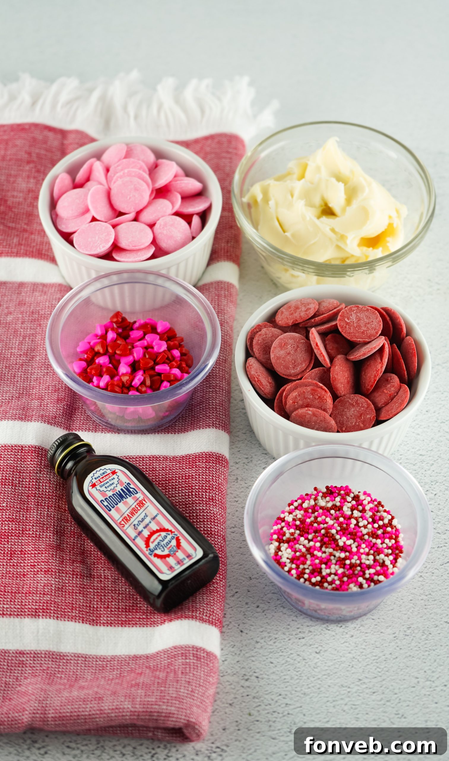 Stacked strawberry fudge squares with sprinkles