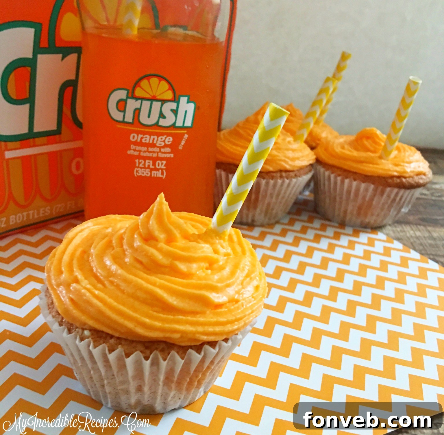 A festive display of Orange Creamsicle Cupcakes, ideal for parties.