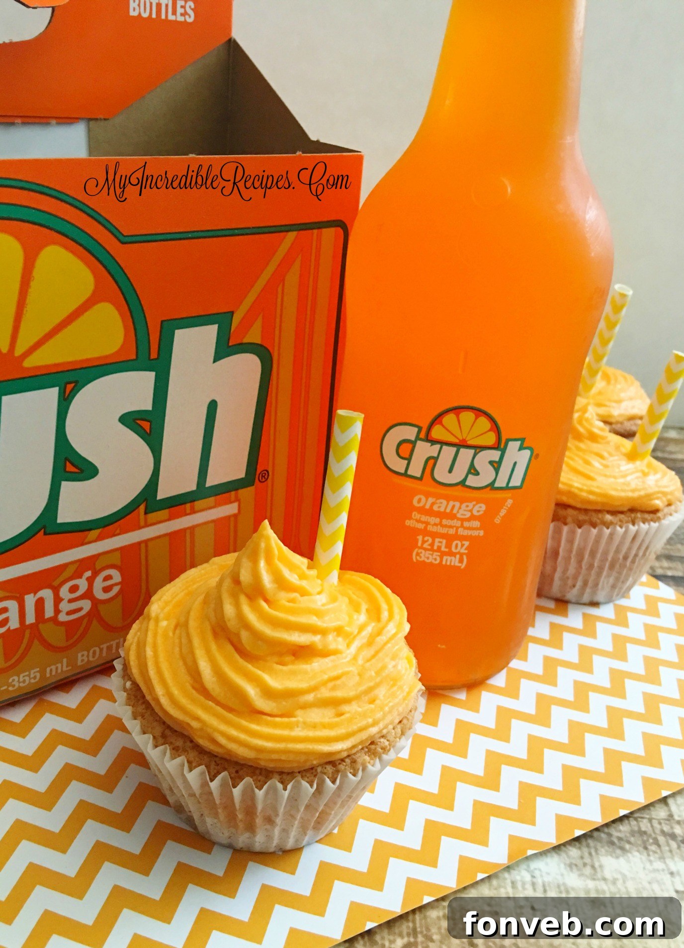 An Orange Creamsicle Cupcake presented with a vibrant and inviting look.