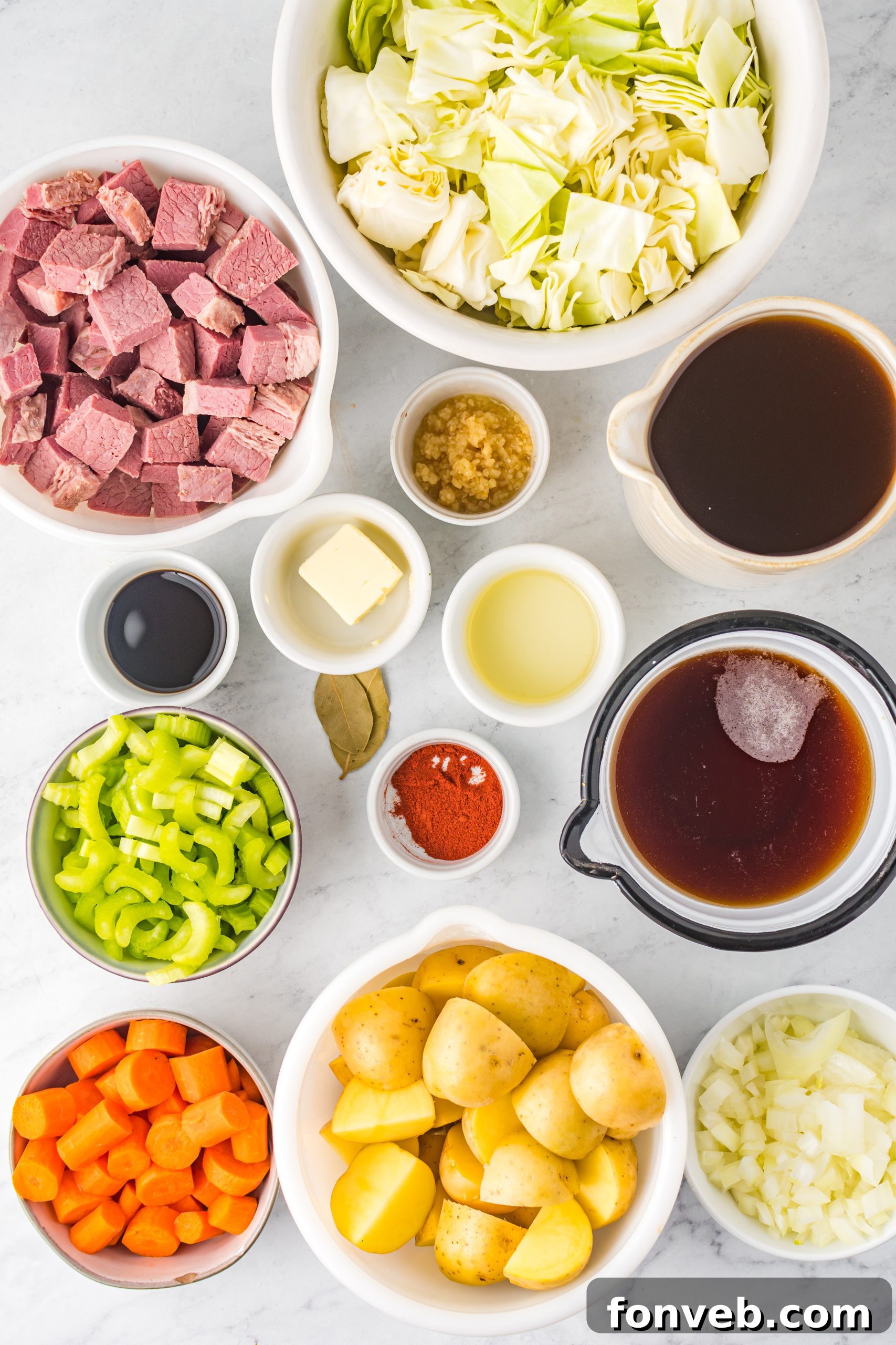 Slow Cooker Corned Beef and Cabbage Soup in a bowl with crusty bread