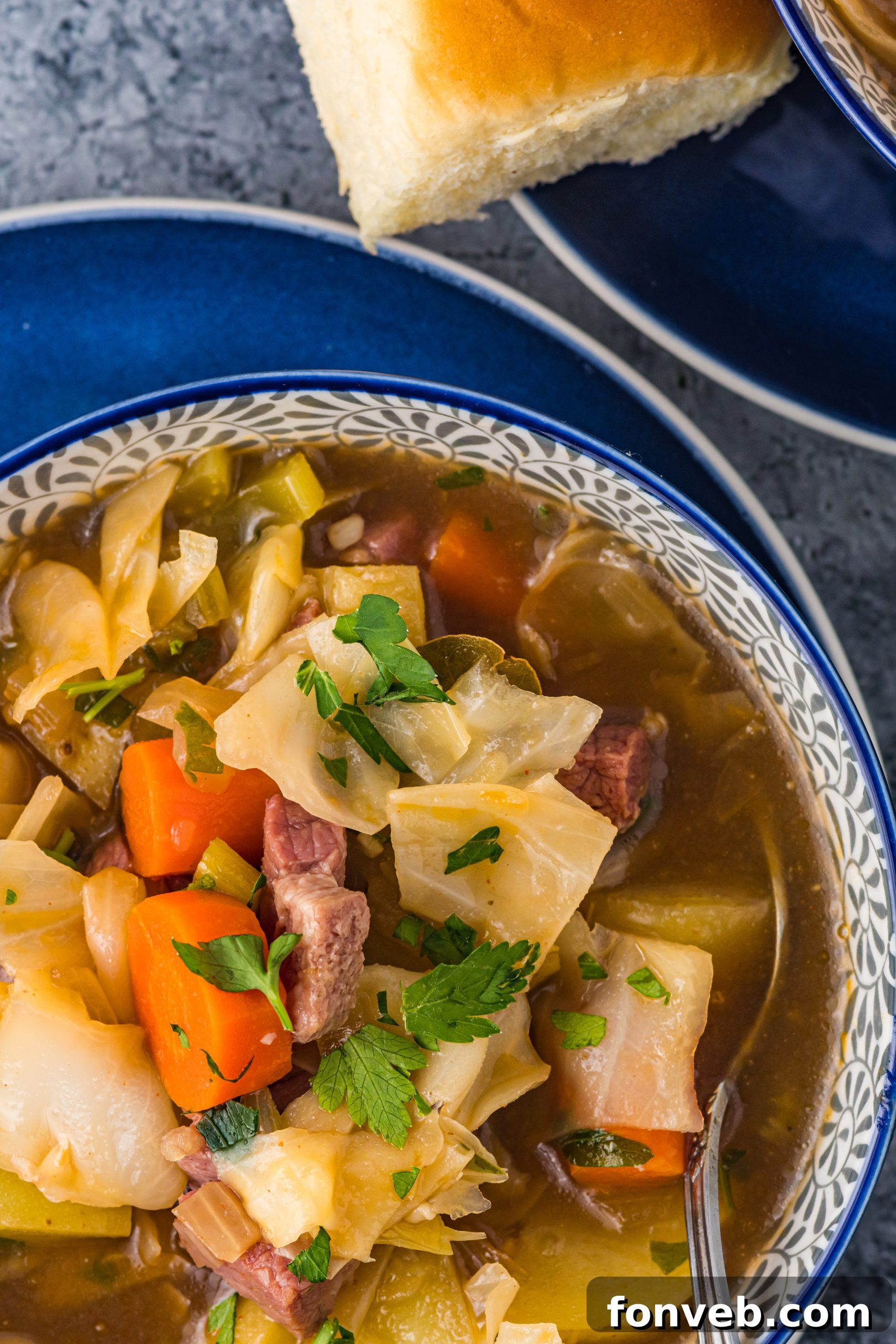 Slow Cooker Corned Beef and Cabbage Soup being served