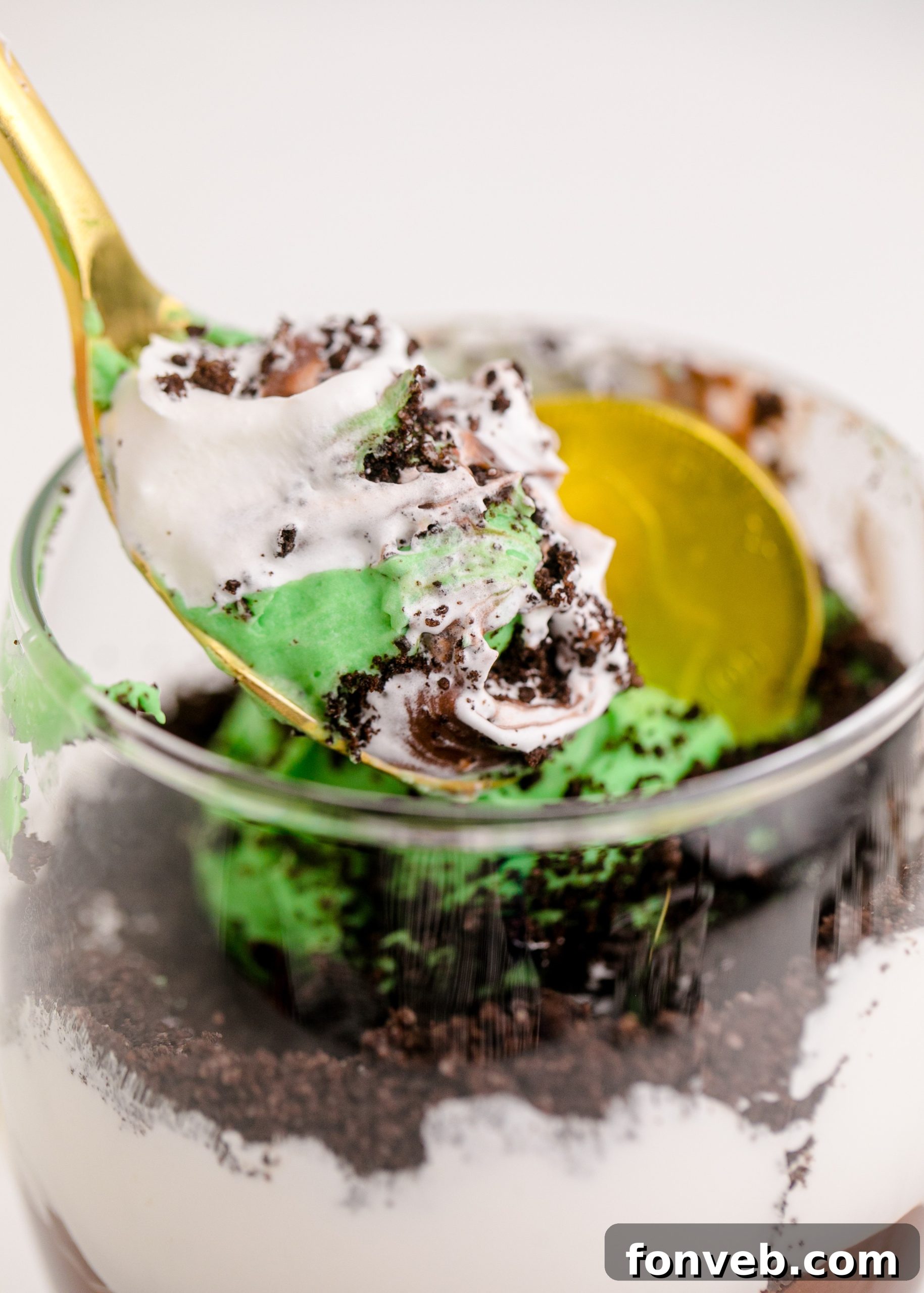 Close-up of a St. Patrick's Day Pudding Cup with a gold chocolate coin