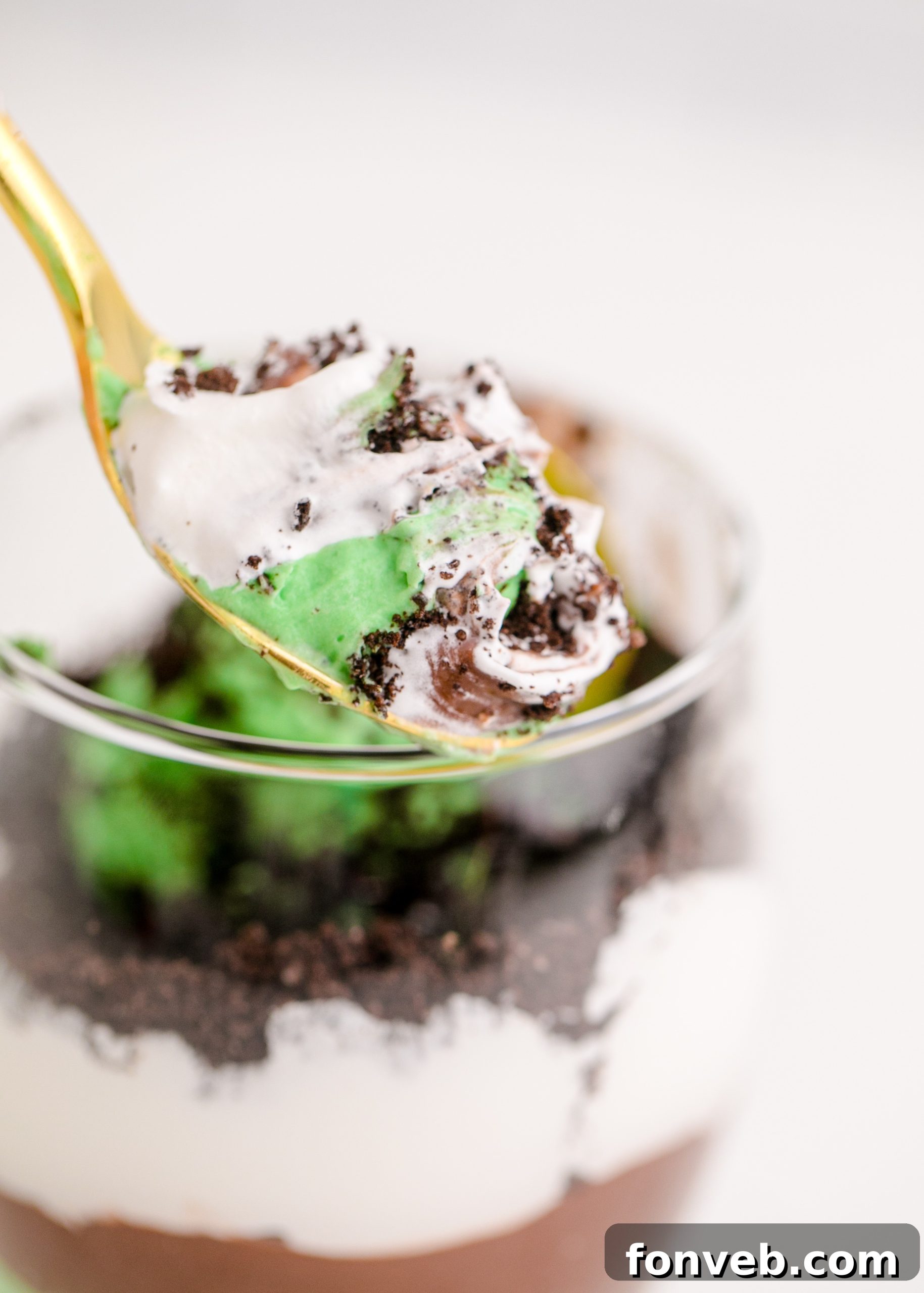 St. Patrick's Day Pudding Cups on a decorative board