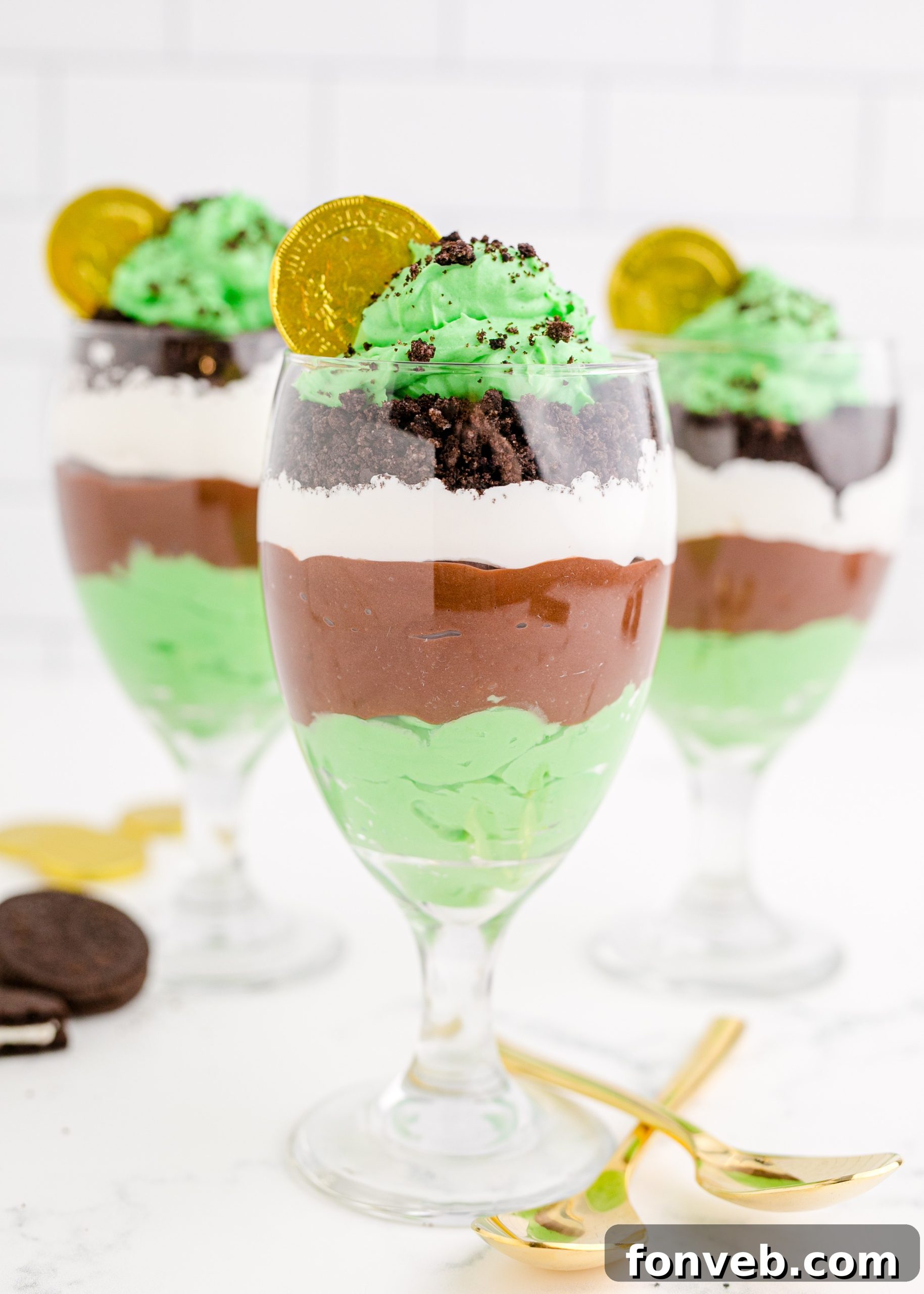 St. Patrick's Day Pudding Cups with a clovers background