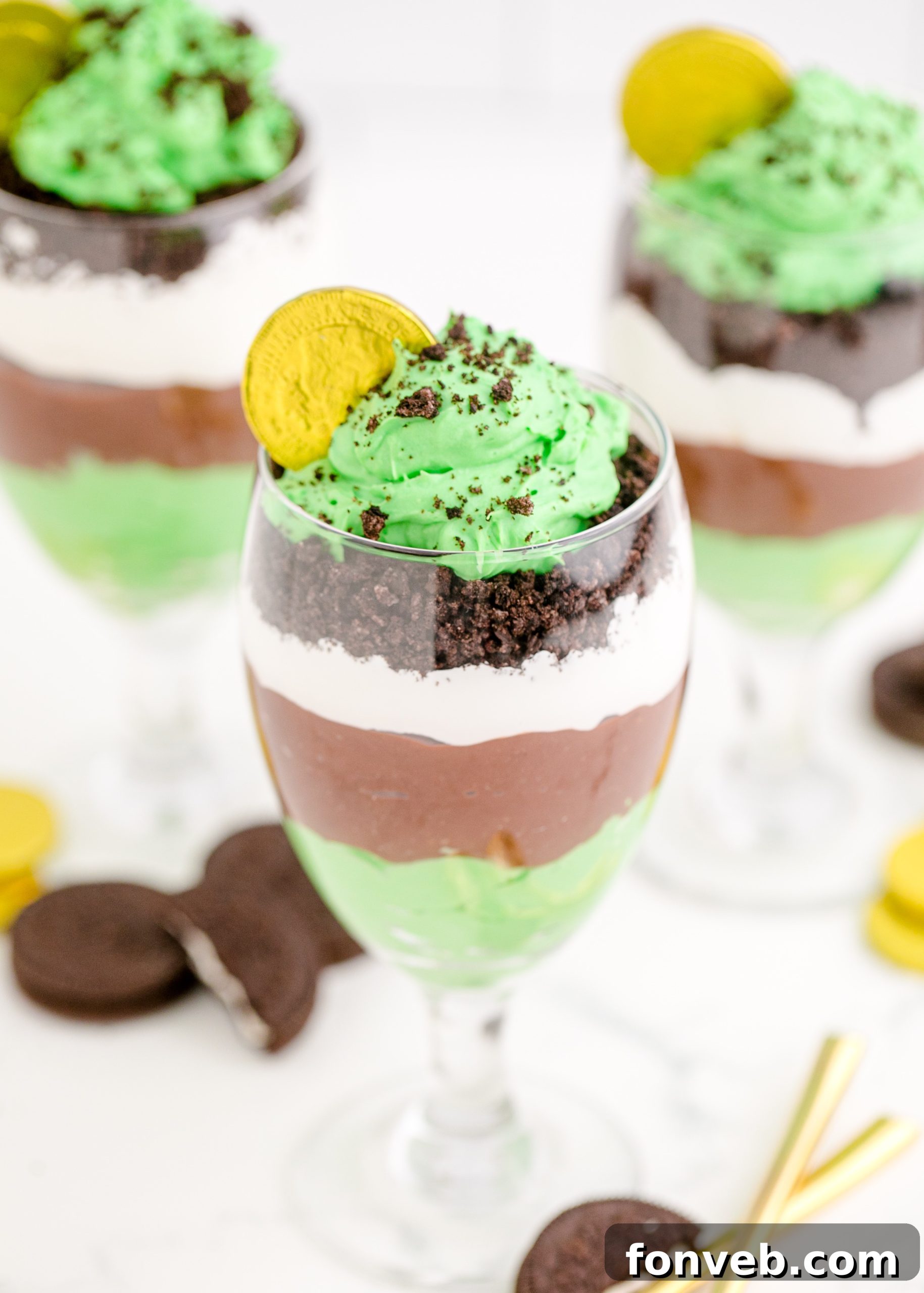 A hand holding a St. Patrick's Day Pudding Cup