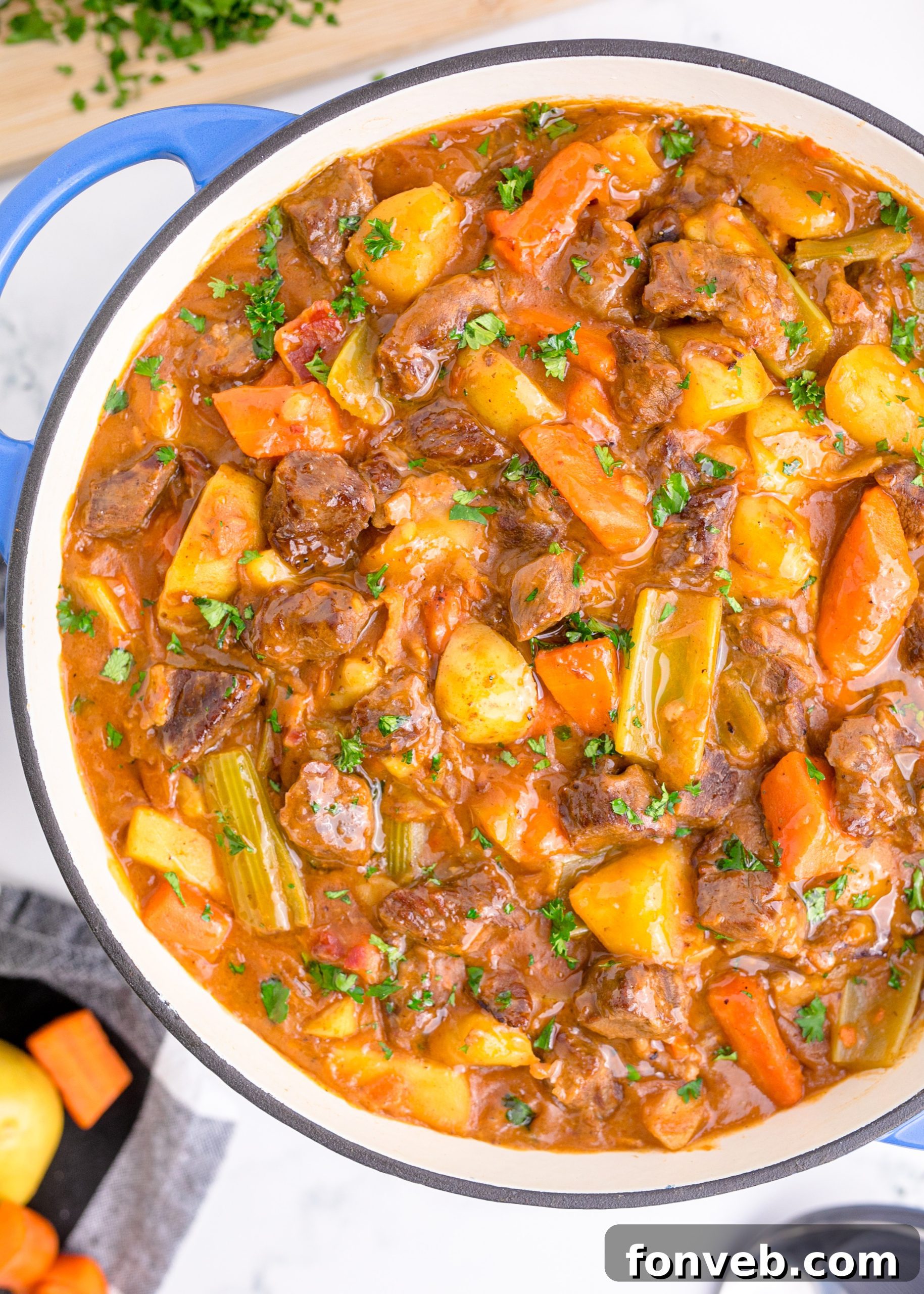 Ingredients simmering in a Dutch oven, creating a rich broth