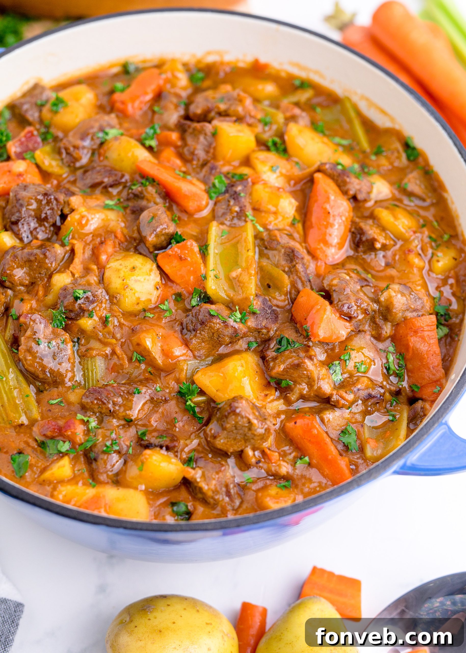 A serving of Guinness Beef Stew with a side of cornbread