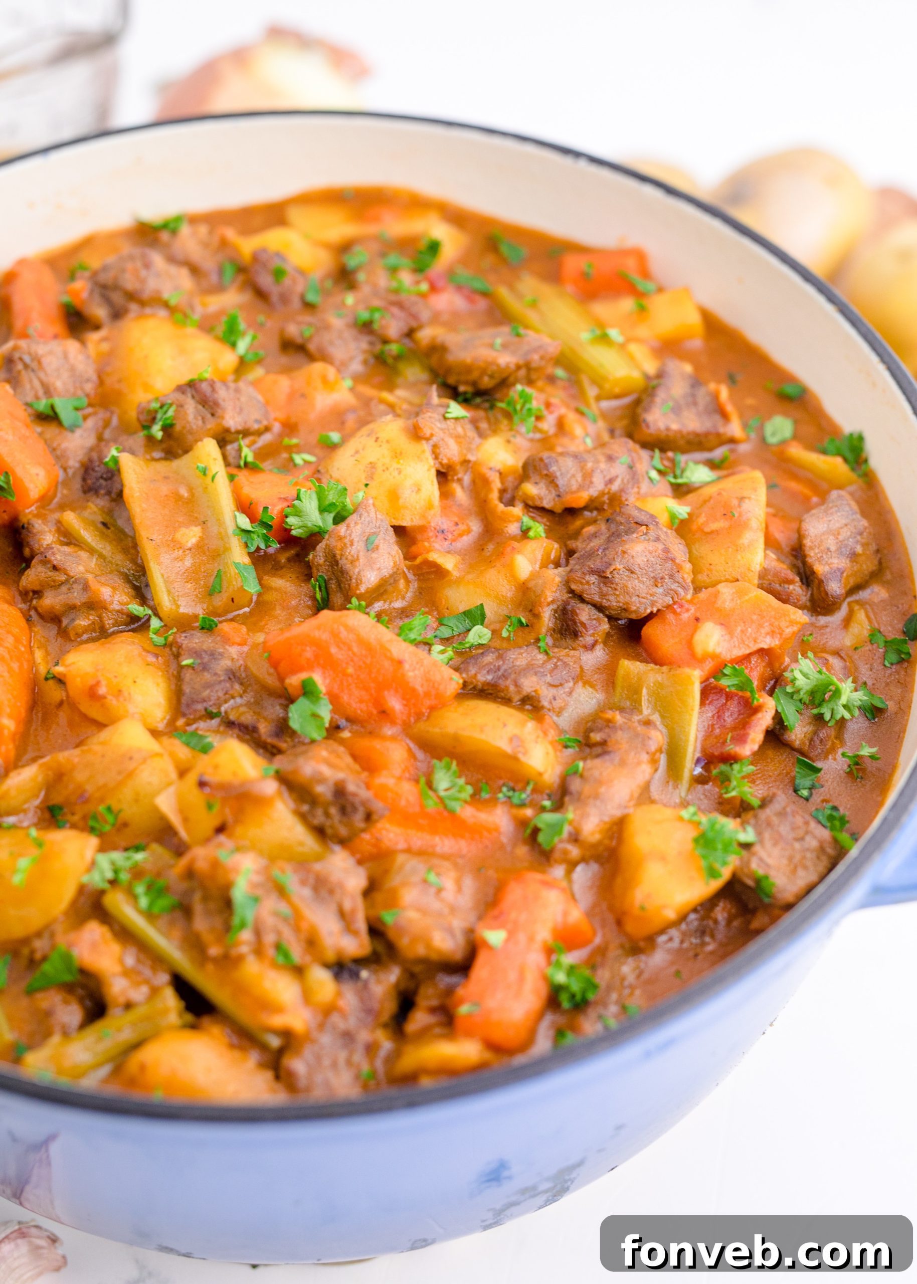 Guinness Beef Stew with bread on the side, ready to be served