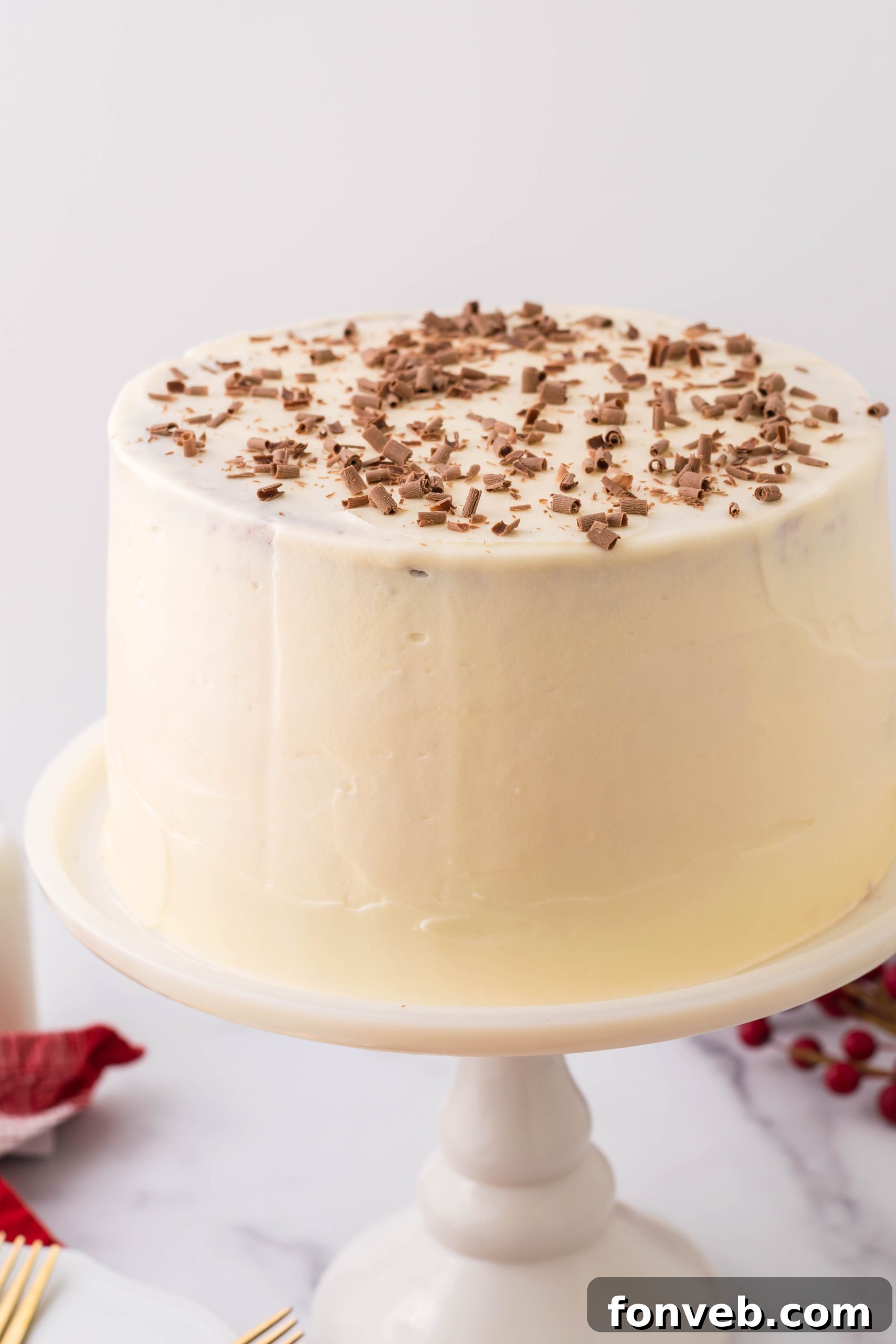 Another close-up of a slice of Red Velvet Cheesecake Cake, emphasizing the texture and layers.