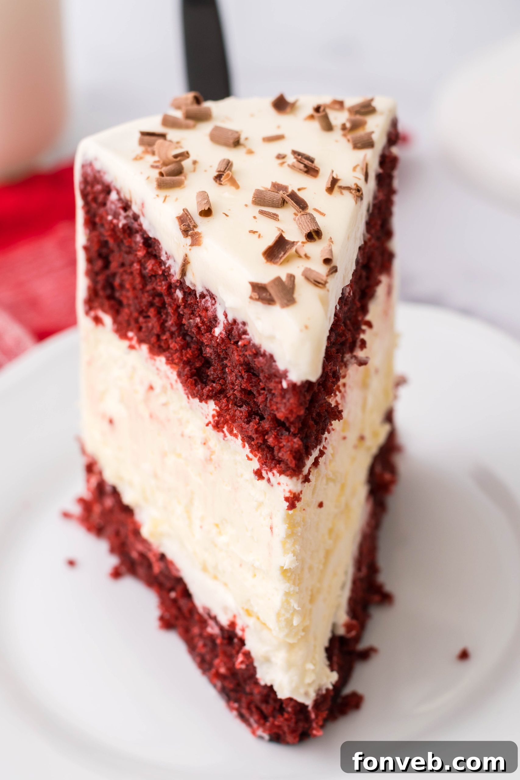 A close-up of the cheesecake batter being poured into a springform pan.