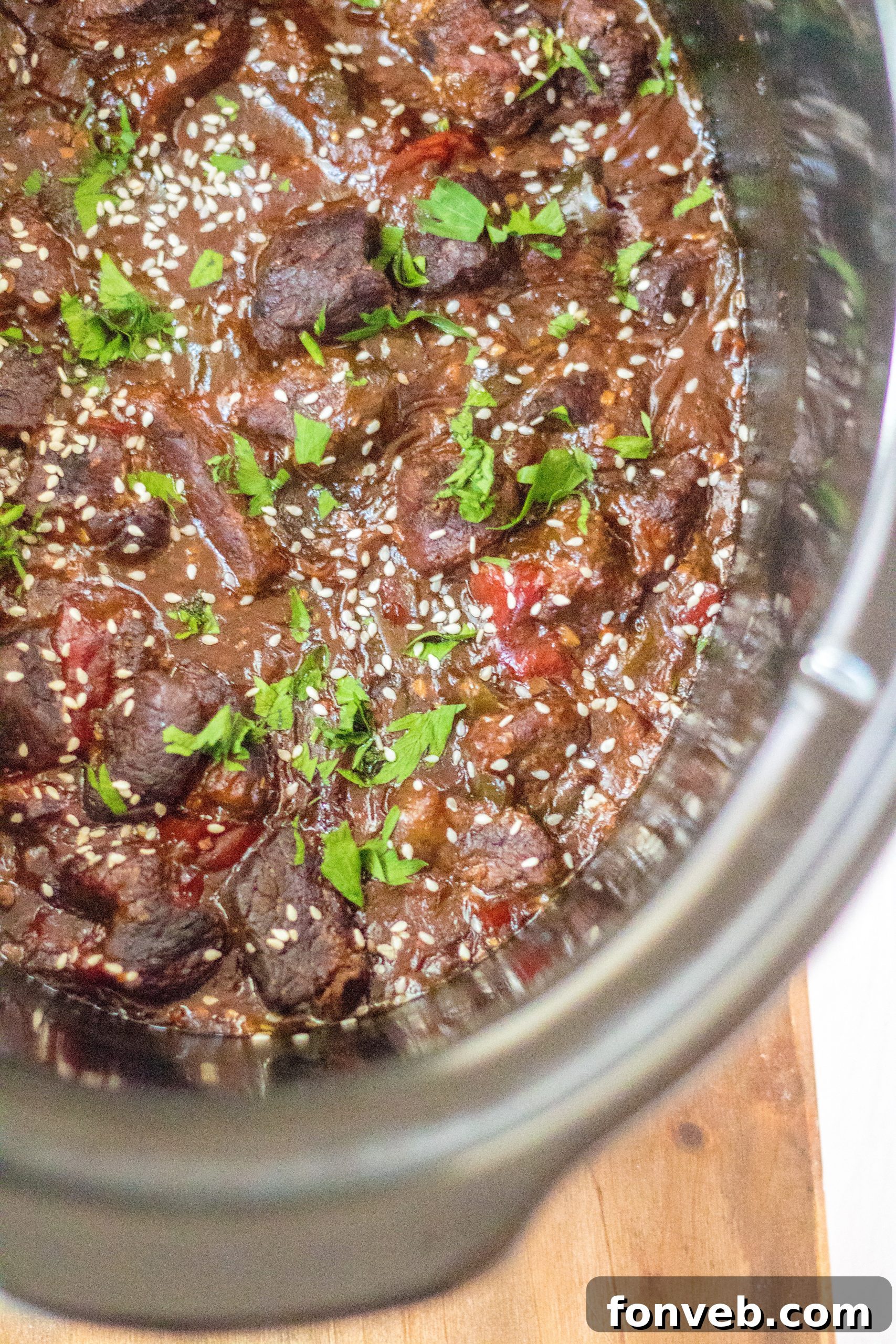 Hearty Slow Cooker Pepper Steak with Onions 10 Plated Slow Cooker Pepper Steak with chopsticks.