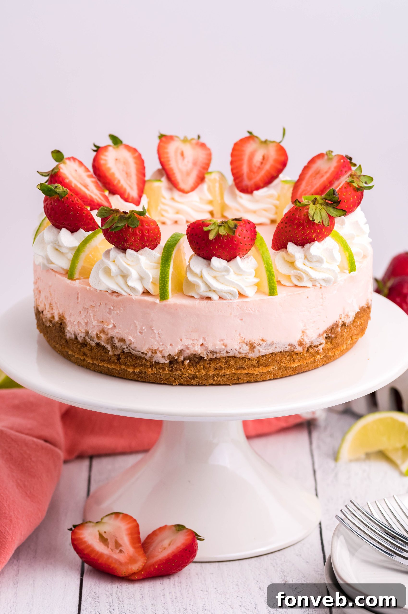 Close-up of a slice of Instant Pot Strawberry Daiquiri Cheesecake on a plate.