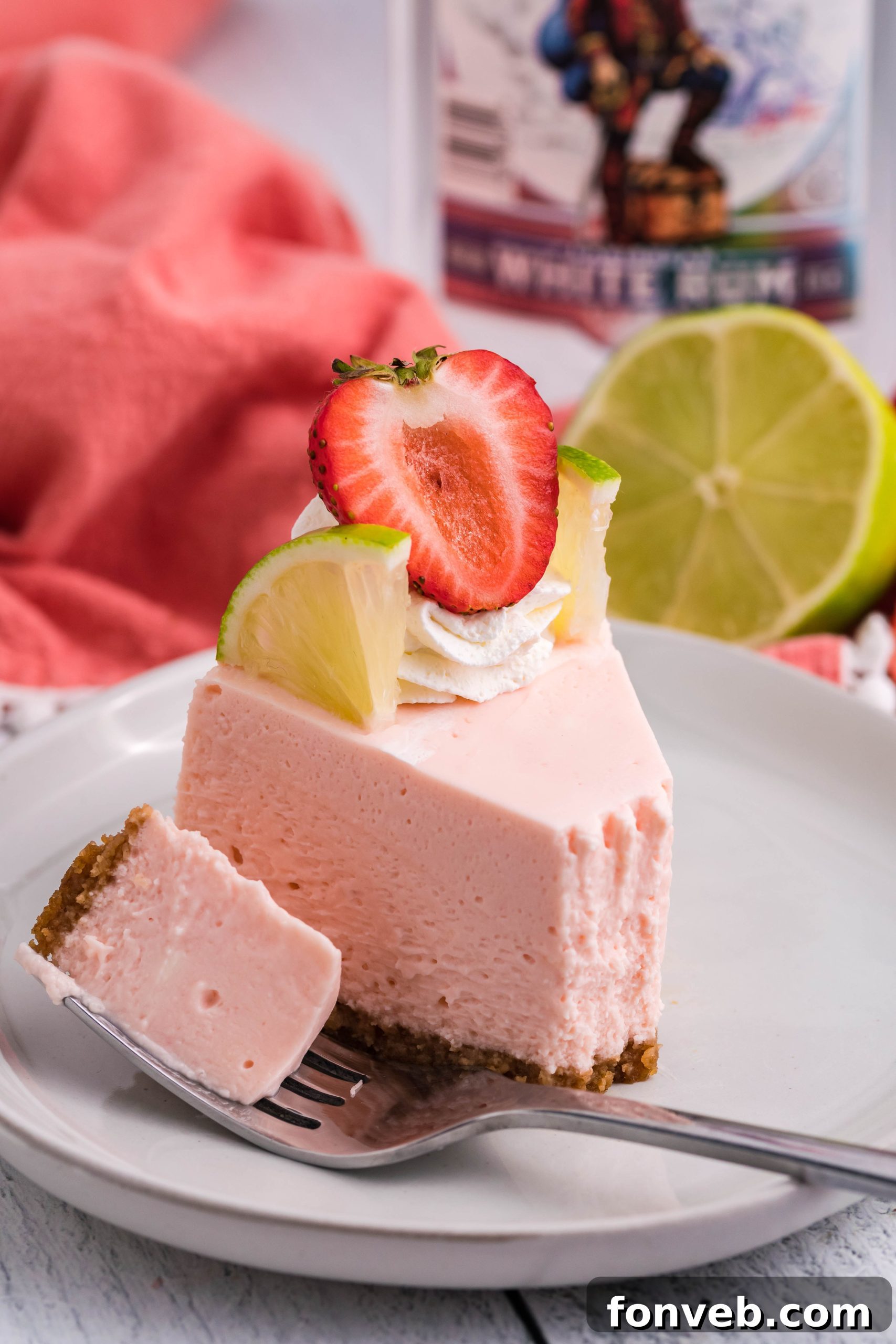 An overhead shot of the Instant Pot Strawberry Daiquiri Cheesecake with toppings.
