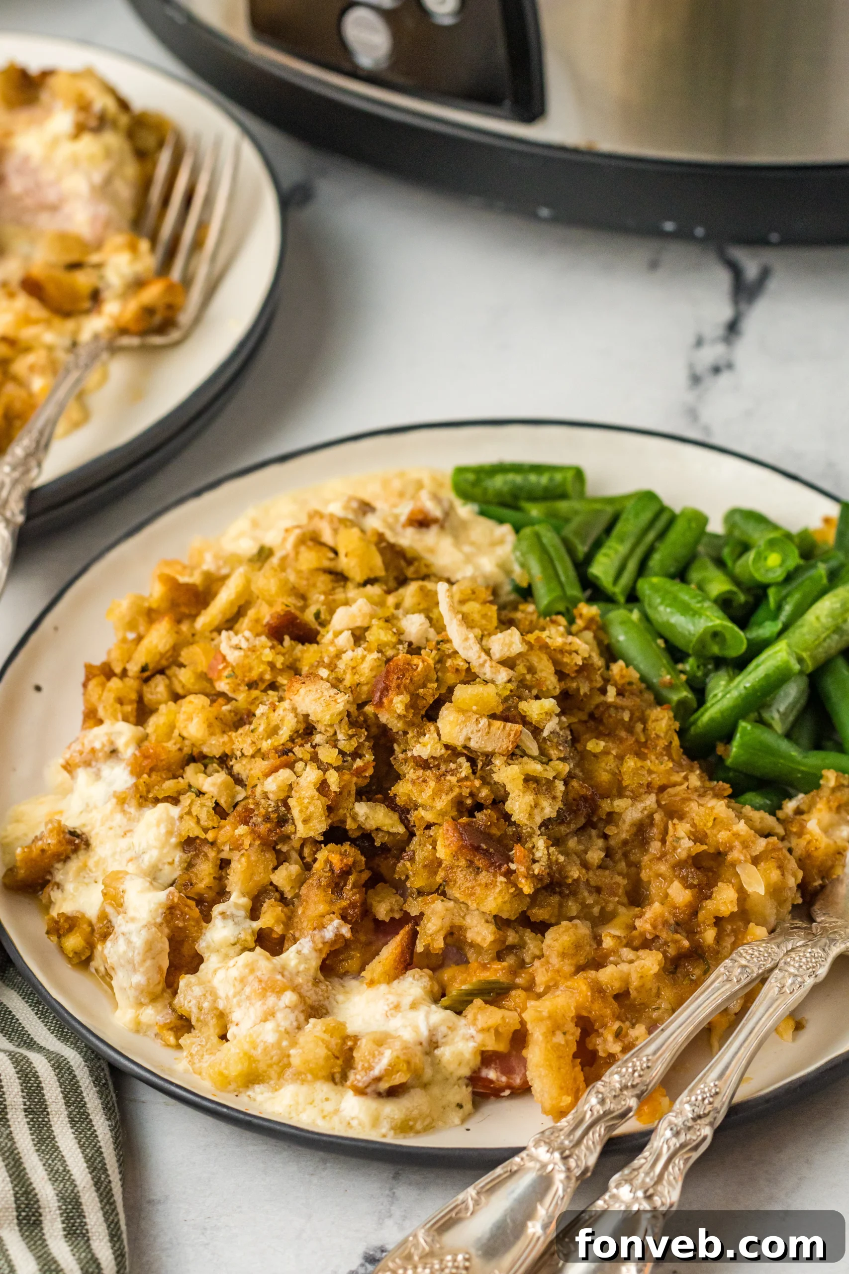 One-Pot Slow Cooker Chicken Cordon Bleu and Stuffing Dinner 14 Finished slow cooker chicken cordon bleu served in a dish.