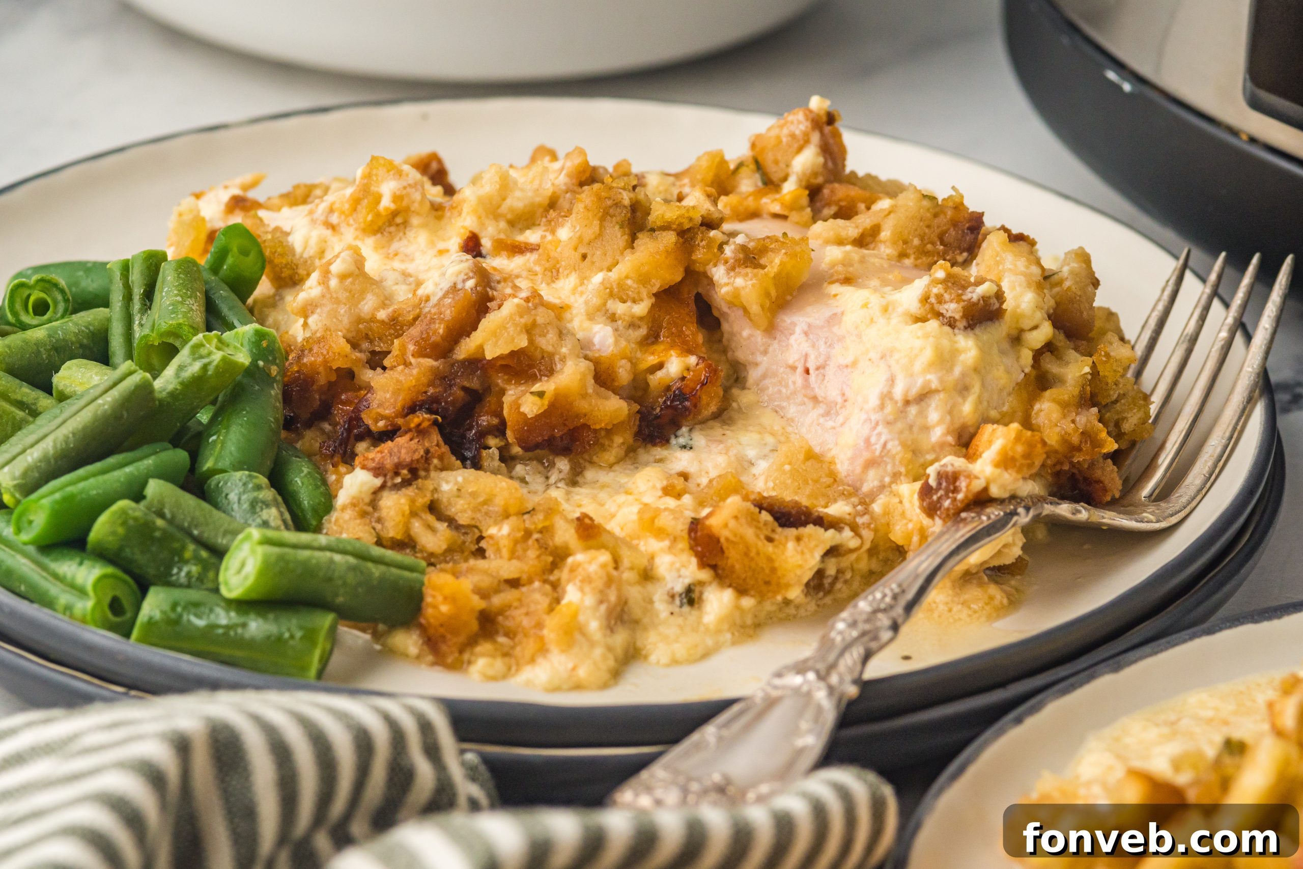 One-Pot Slow Cooker Chicken Cordon Bleu and Stuffing Dinner 10 A box of chicken-flavored stuffing mix, a key topping ingredient.
