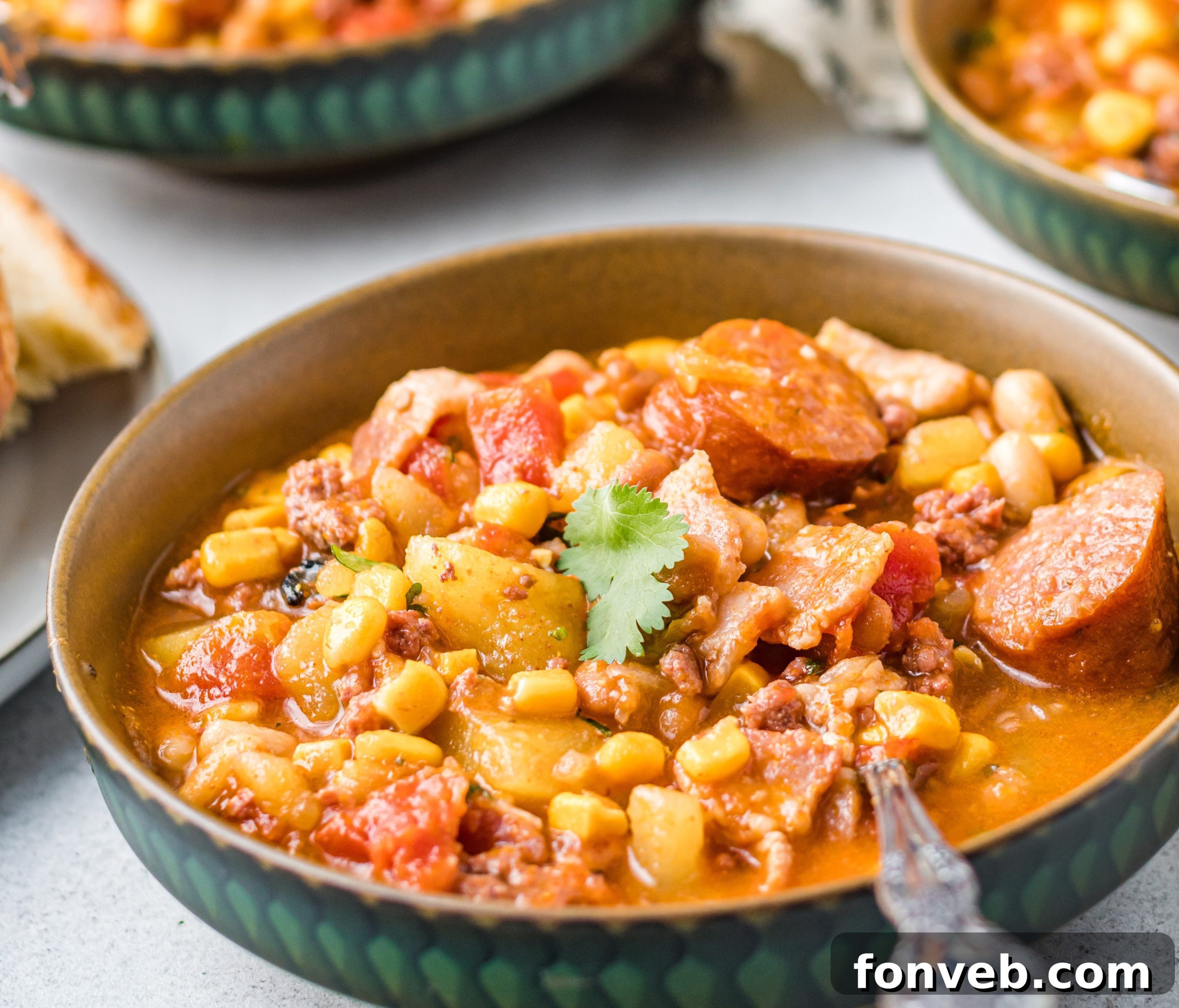 Wrangler's Hearty Stew 6 A beautifully composed shot of Cowboy Stew in a serving pot, ready to be dished out.