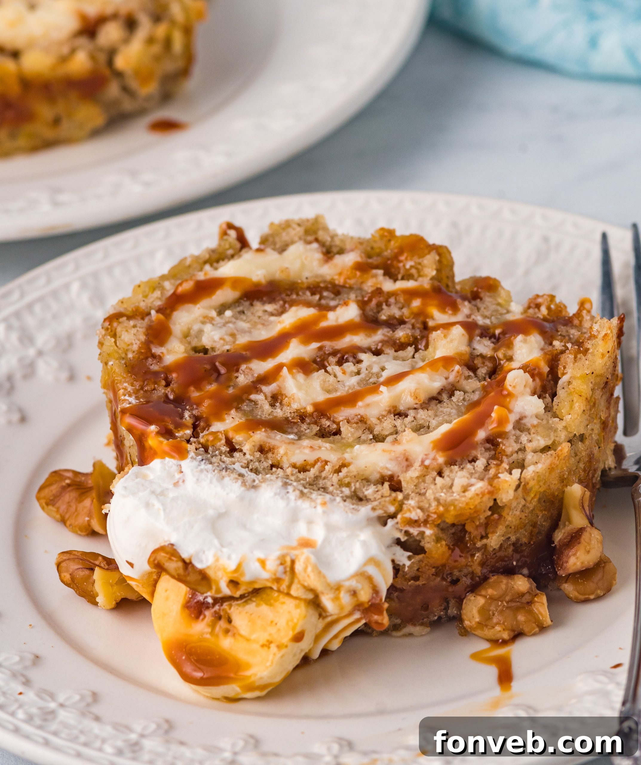 Final banana cake roll without caramel, possibly dusted with powdered sugar